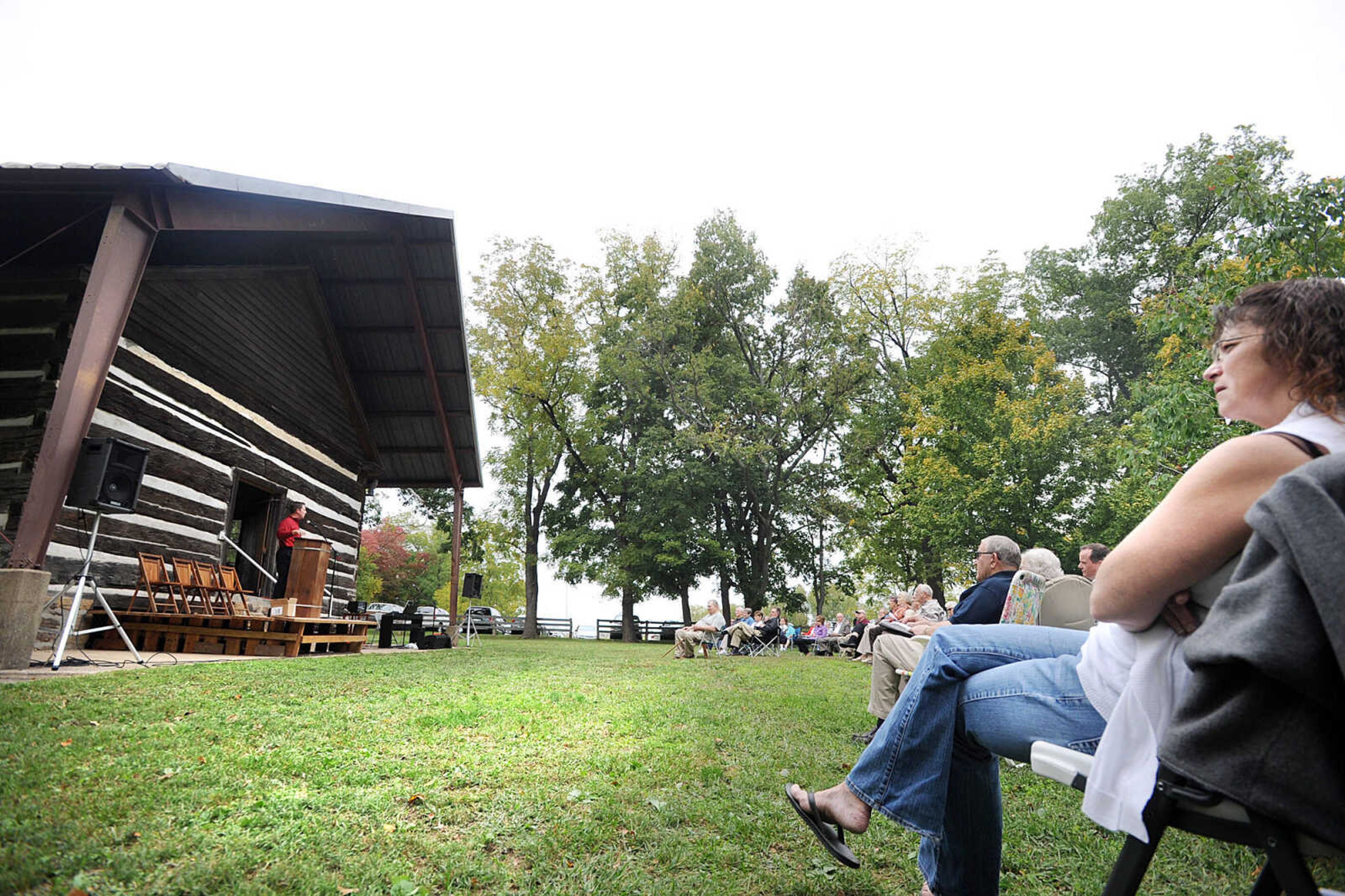 LAURA SIMON ~ lsimon@semissourian.com
Bev Rhodes of Advance, Mo. listens as Rev. Michael Schriener of Morning Star Church gives his message to around 100 people Sunday, Sept. 30, 2012 during the annual pilgrimage worship gathering at Old McKendree Chapel in Jackson, Mo. The chapel was built in 1819 and is known as the oldest Protestant church standing west of the Mississippi River.