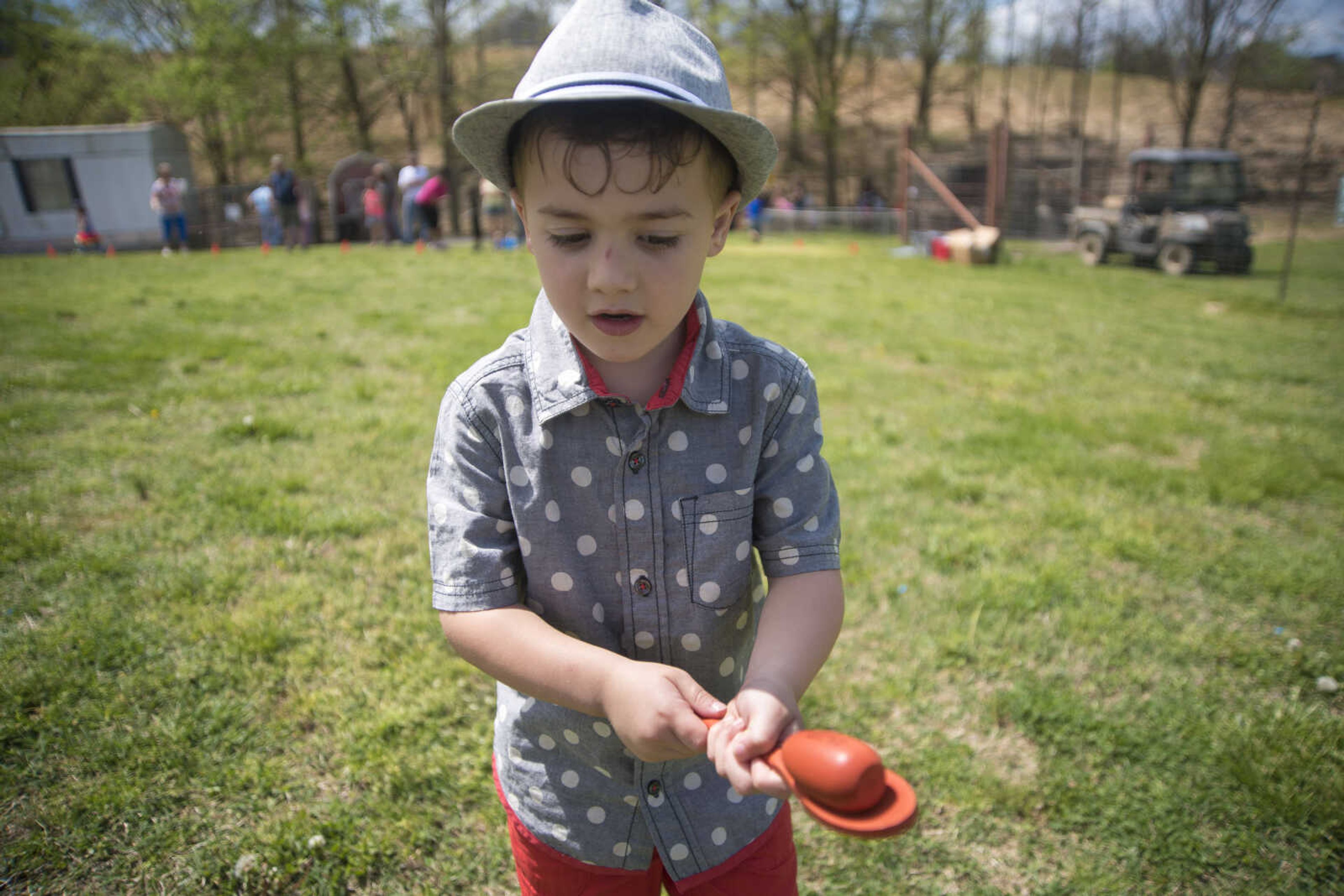 Liam McGill, 4, competes in the egg race during the Safari Egg Hunt Saturday, April 15, 2017 at Lazy L Safari Park in Cape Girardeau.