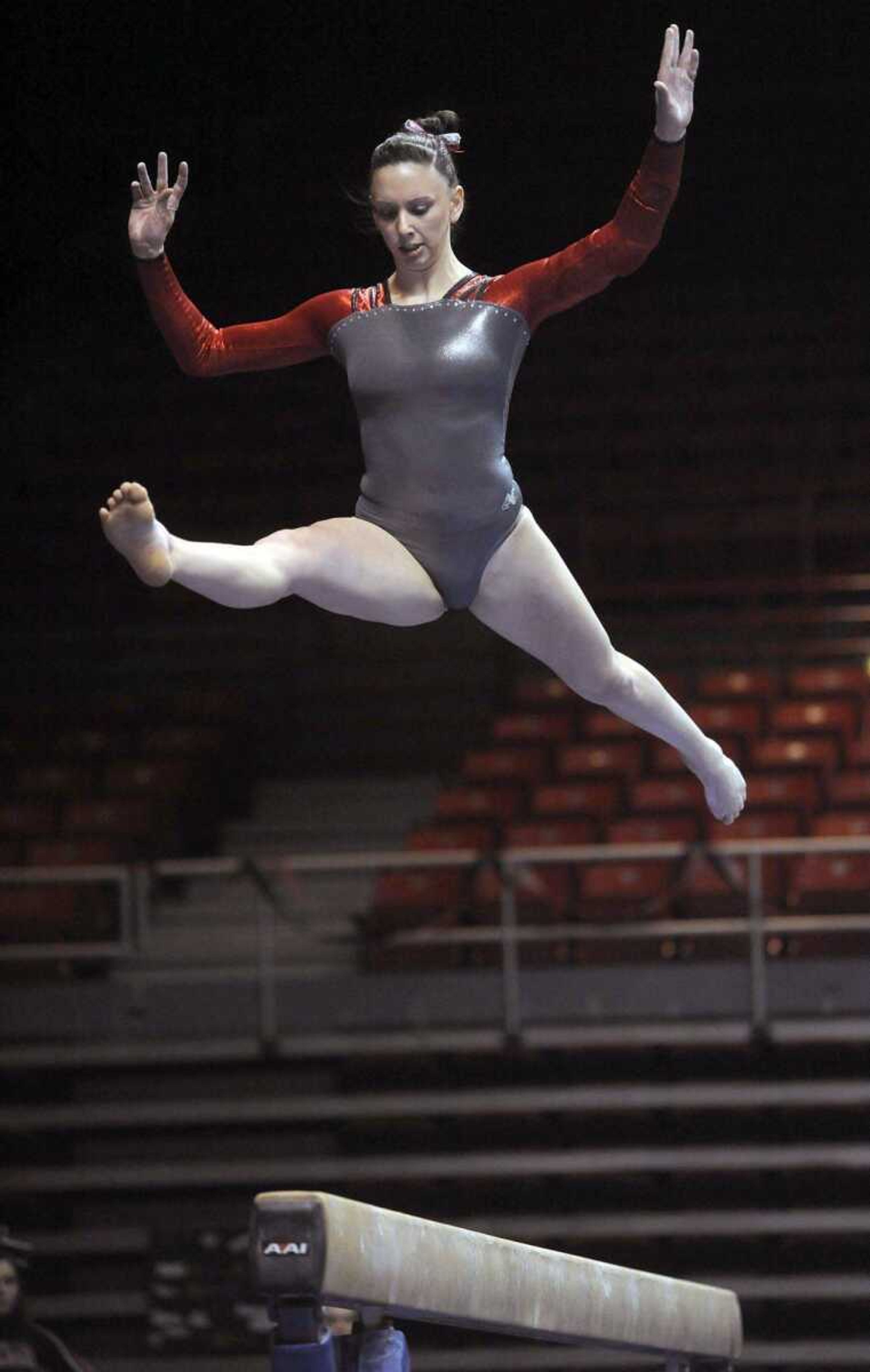 Southeast Missouri State senior Erin Brady competes on the balance beam in a meet with Illinois State on Sunday at the Show Me Center. The Redhawks posted a season-high total of 195.025 to win their final home meet of the season. (Fred Lynch)