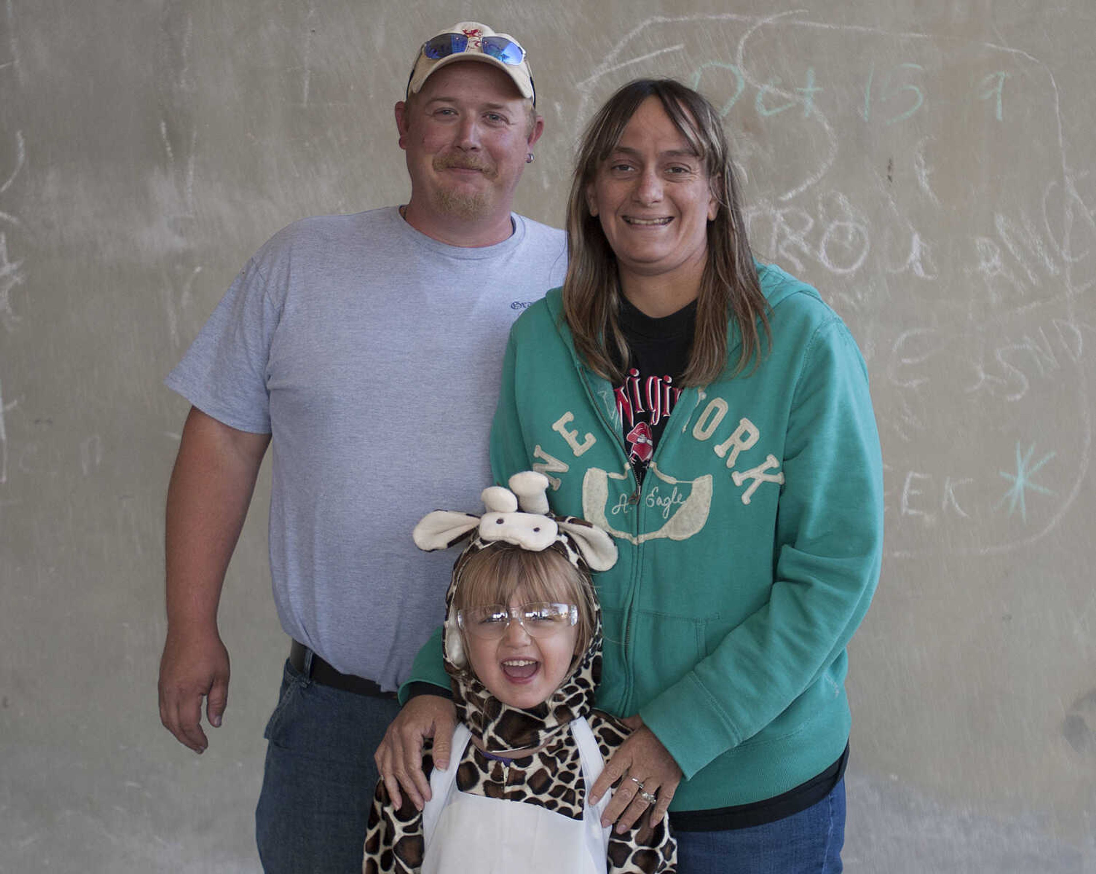 Chris, left, Jackie and Laura Morton, 4, at the fifth annual Halloween Science Night Sunday, Oct. 20, on the campus of Southeast Missouri State University.