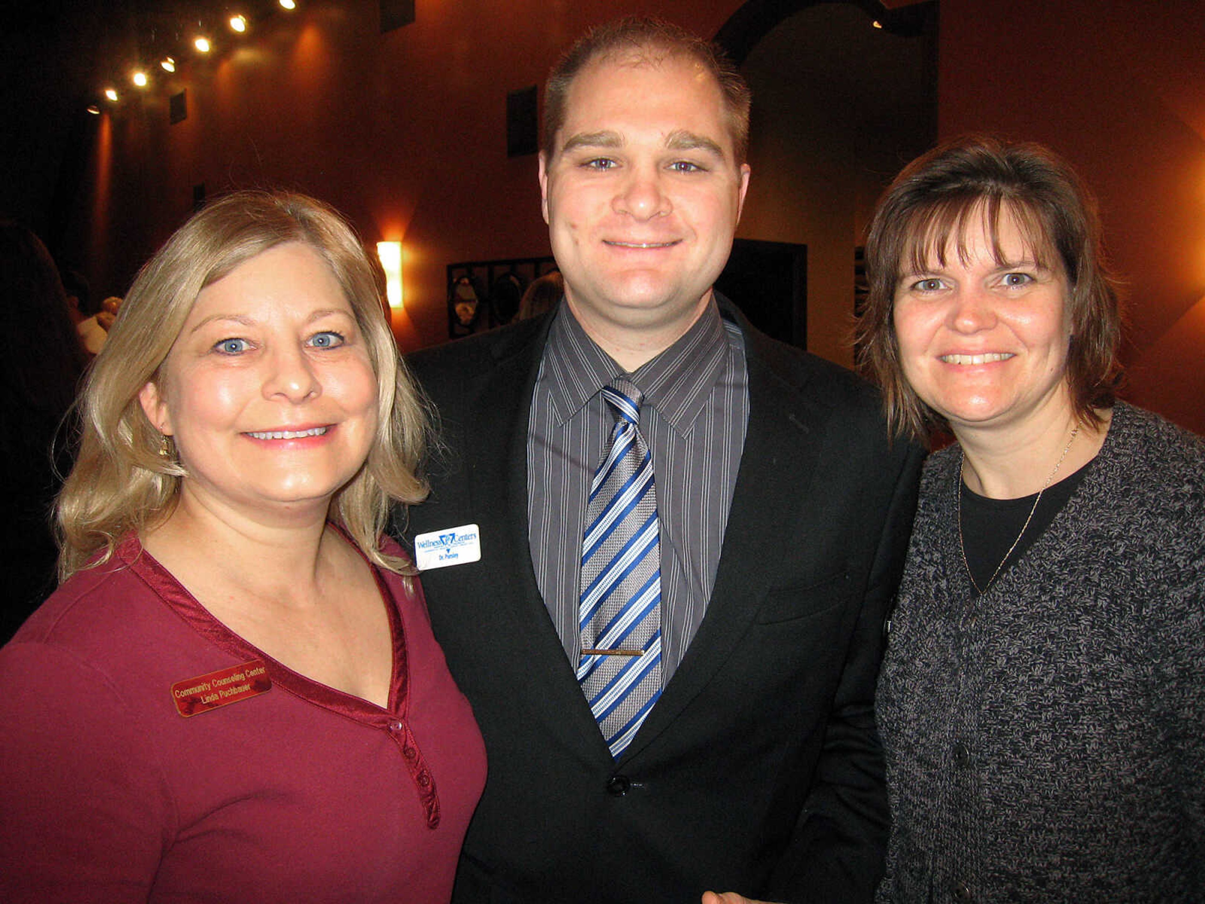 Linda Puchbauer, Community Counseling Center, Dr. Greg Pursley, PC Wellness Centers, and Susan Berghoff, 1st Class Travel