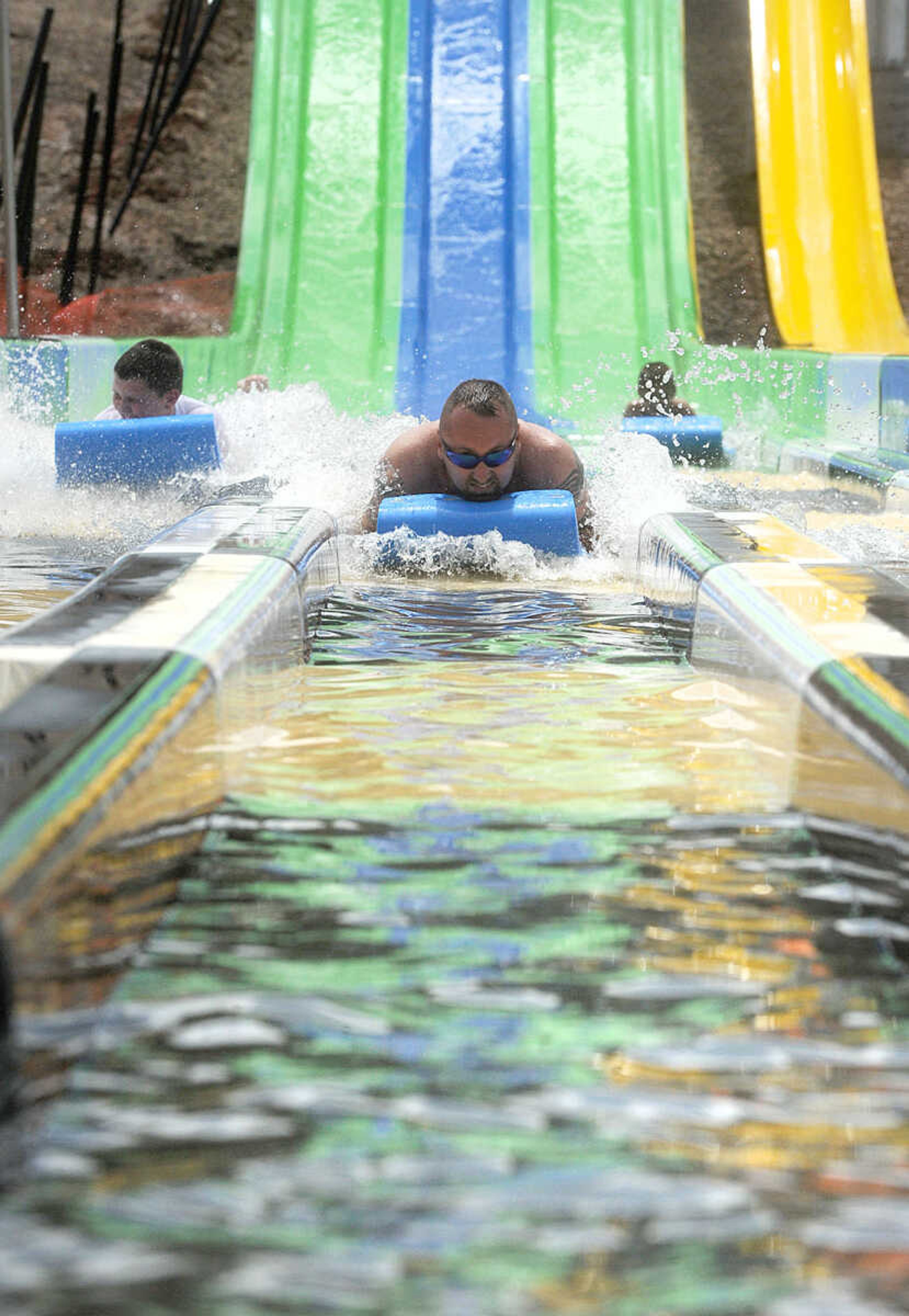 LAURA SIMON ~ lsimon@semissourian.com

The Cape Girardeau Parks and Recreation Department opened the new 265-foot-long free-fall slide, 259-foot-long triple-drop slide and a three-Lane 319-foot-long mat racer with 30-foot tower, at Cape Splash Family Aquatic Center, Thursday, July 9, 2015.