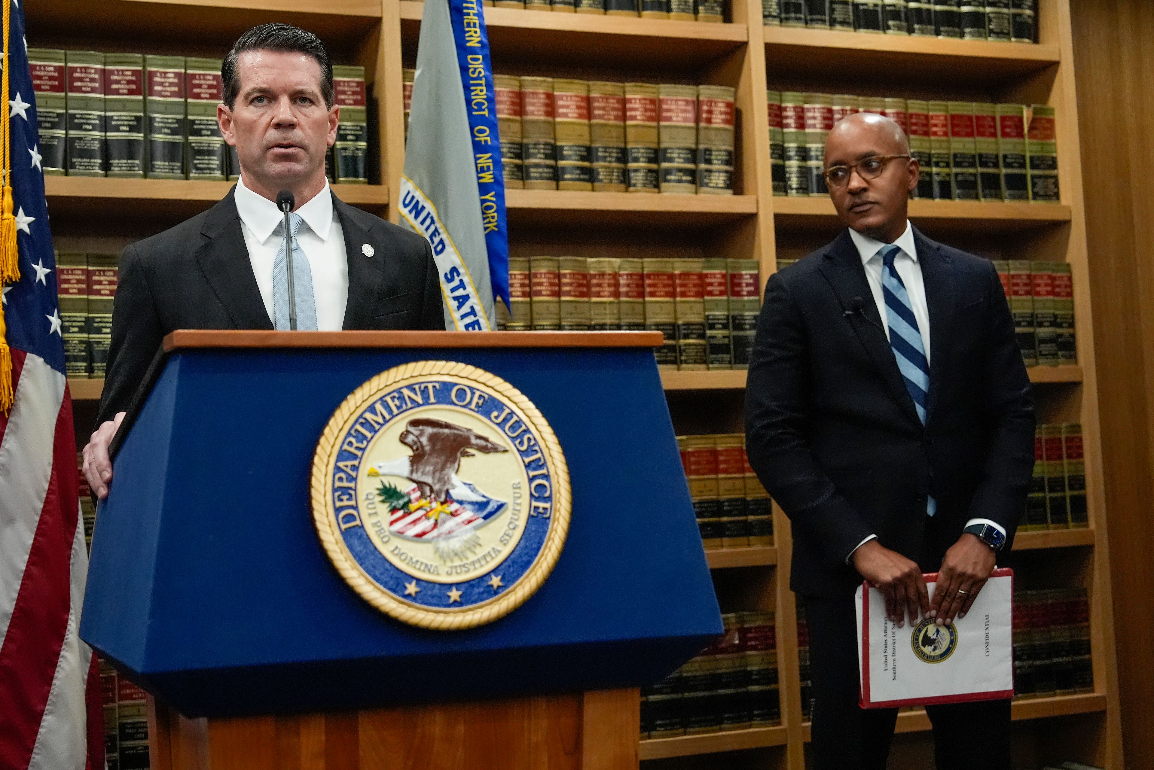 James Dennehy, FBI New York Assistant Director in Charge, left, speaks at a news conference detailing an indictment against New York City Mayor Eric Adams as U.S. Attorney Damian Williams looks on, Thursday, Sept. 26, 2024, in New York. (AP Photo/Julia Demaree Nikhinson)