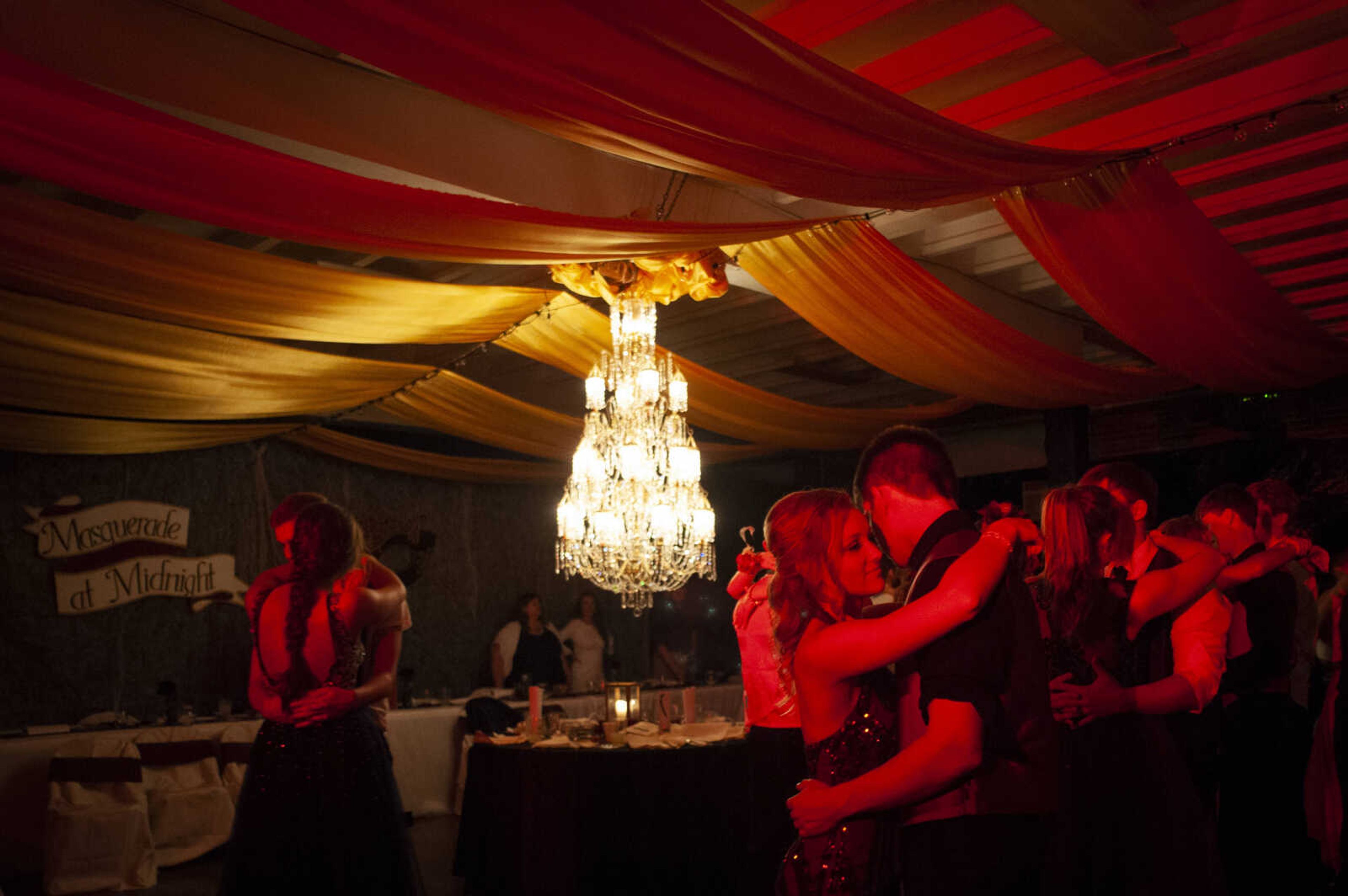 Woodland junior Whitney Jordan dances Leopold junior Luke Eftink during Leopold High School's "Masquerade at Midnight" prom Saturday, April 27, 2019, in Leopold.