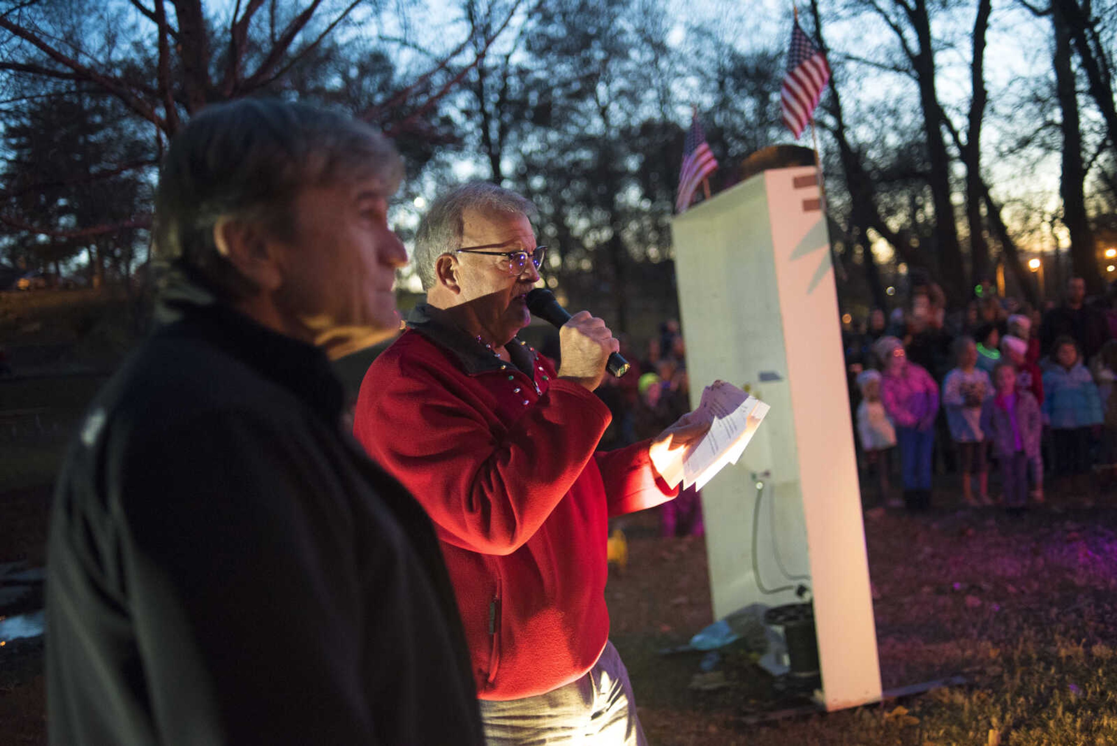 Kirk Williams and Mayor Dwain Hahs speak during the Jackson Holiday Extravaganza Friday, Nov. 24, 2017 at the Jackson City Park.