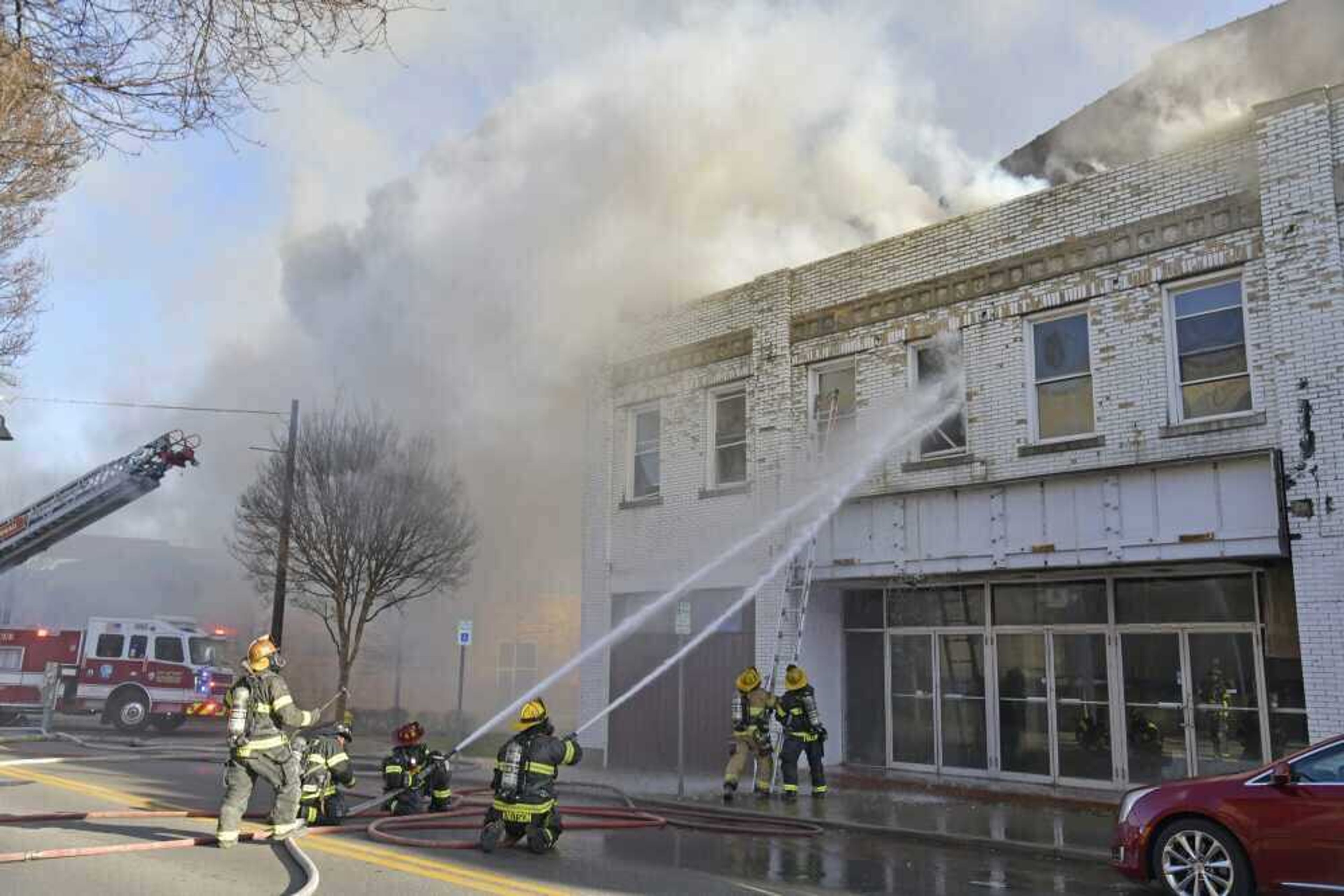 Firefighters working to put out the March 2021 blaze that caused significant structural damage to Broadway Theatre.