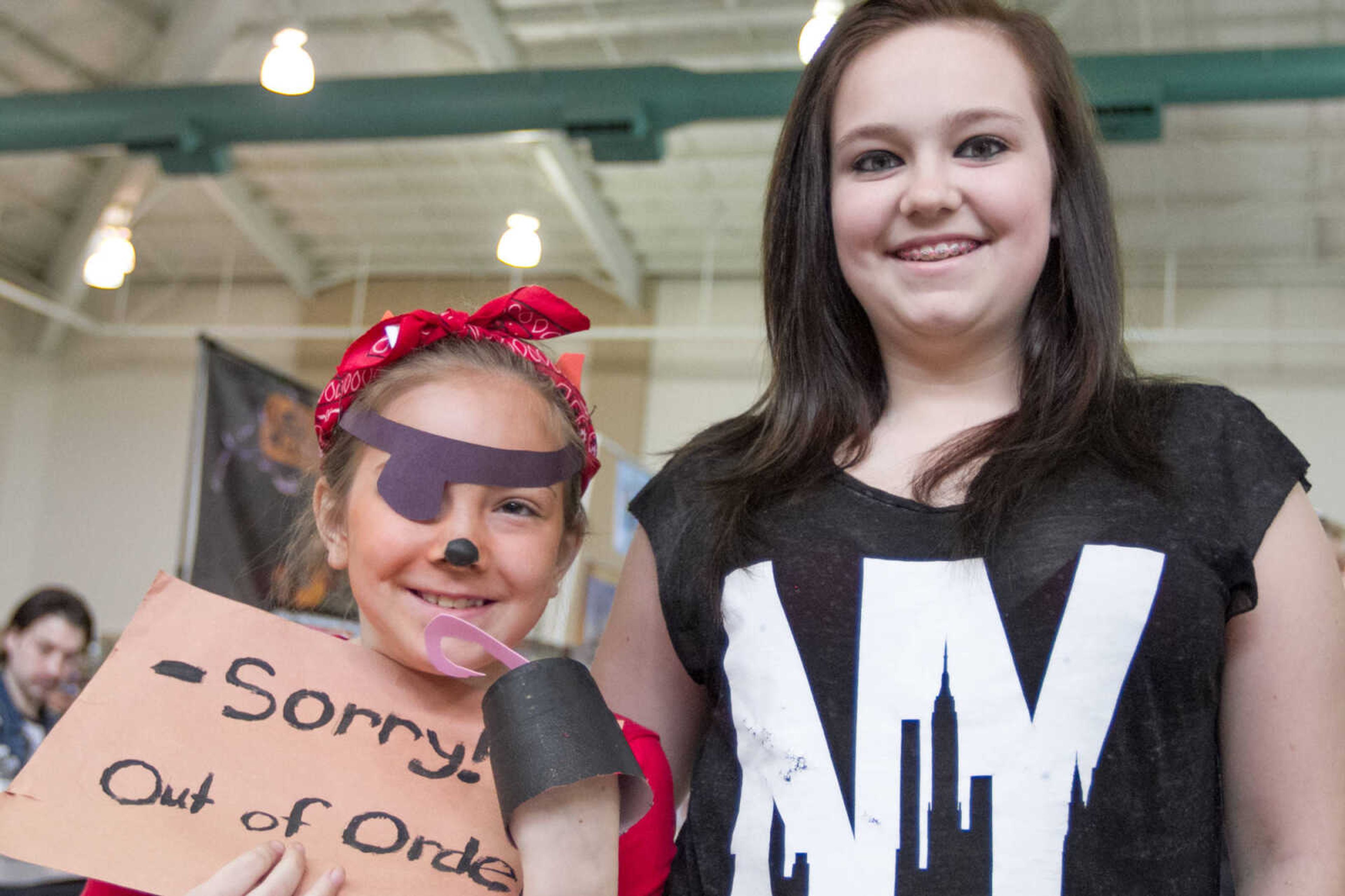 GLENN LANDBERG ~ glandberg@semissourian.com

Kathryn and Amanda Bennett pose for a photo at the Cape Comic Con Saturday, April 18, 2015 at the Osage Centre.