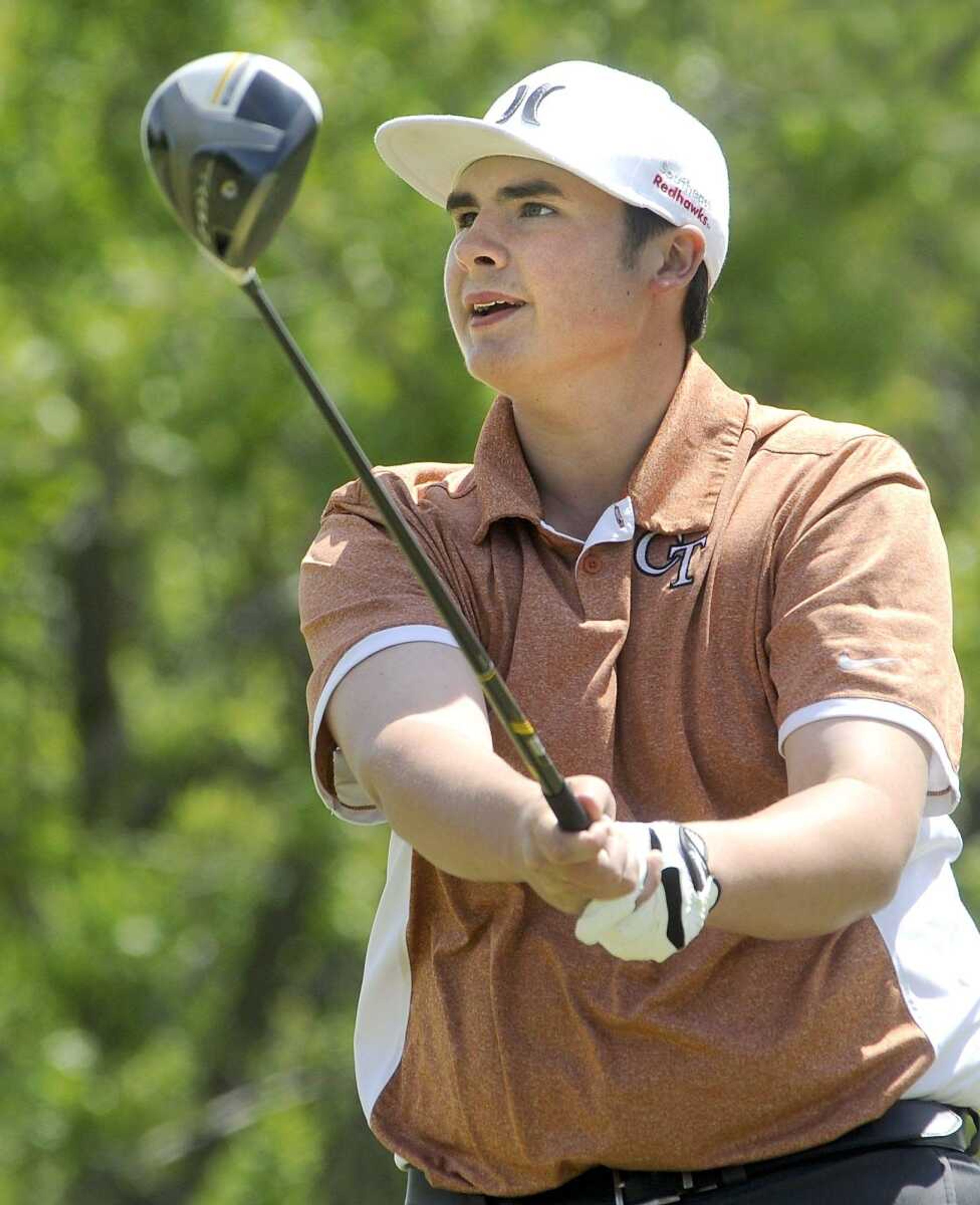 Cape Central's Kobe Franklin watches his drive from the first tee box during the SEMO Conference Tournament Monday, April 27, 2015 in Sikeston, Missouri. (Fred Lynch)