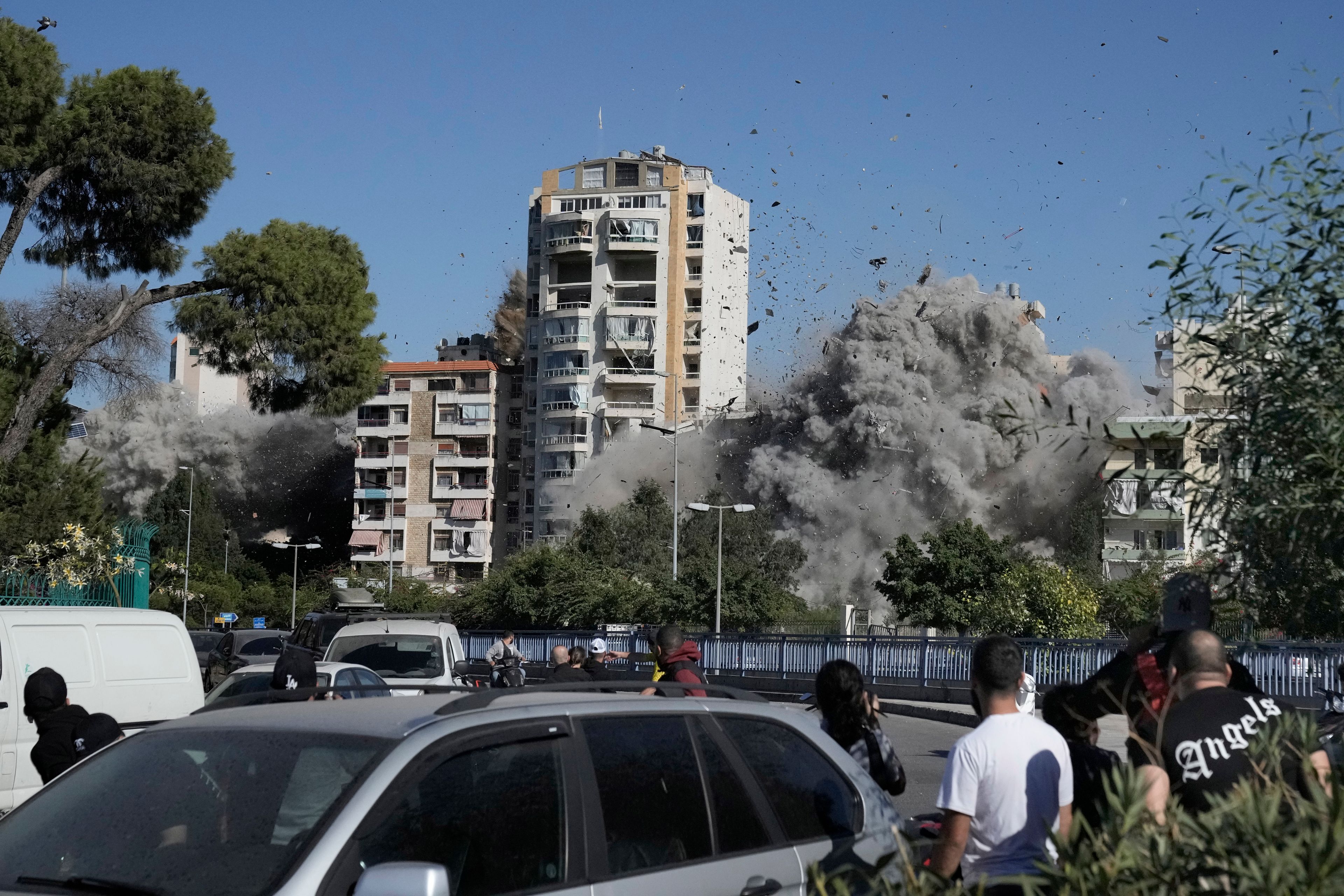 Smoke rises from a building that was hit by an Israeli airstrike in Ghobeiri, Beirut, Lebanon, Tuesday, Oct. 22, 2024. (AP Photo/Bilal Hussein)