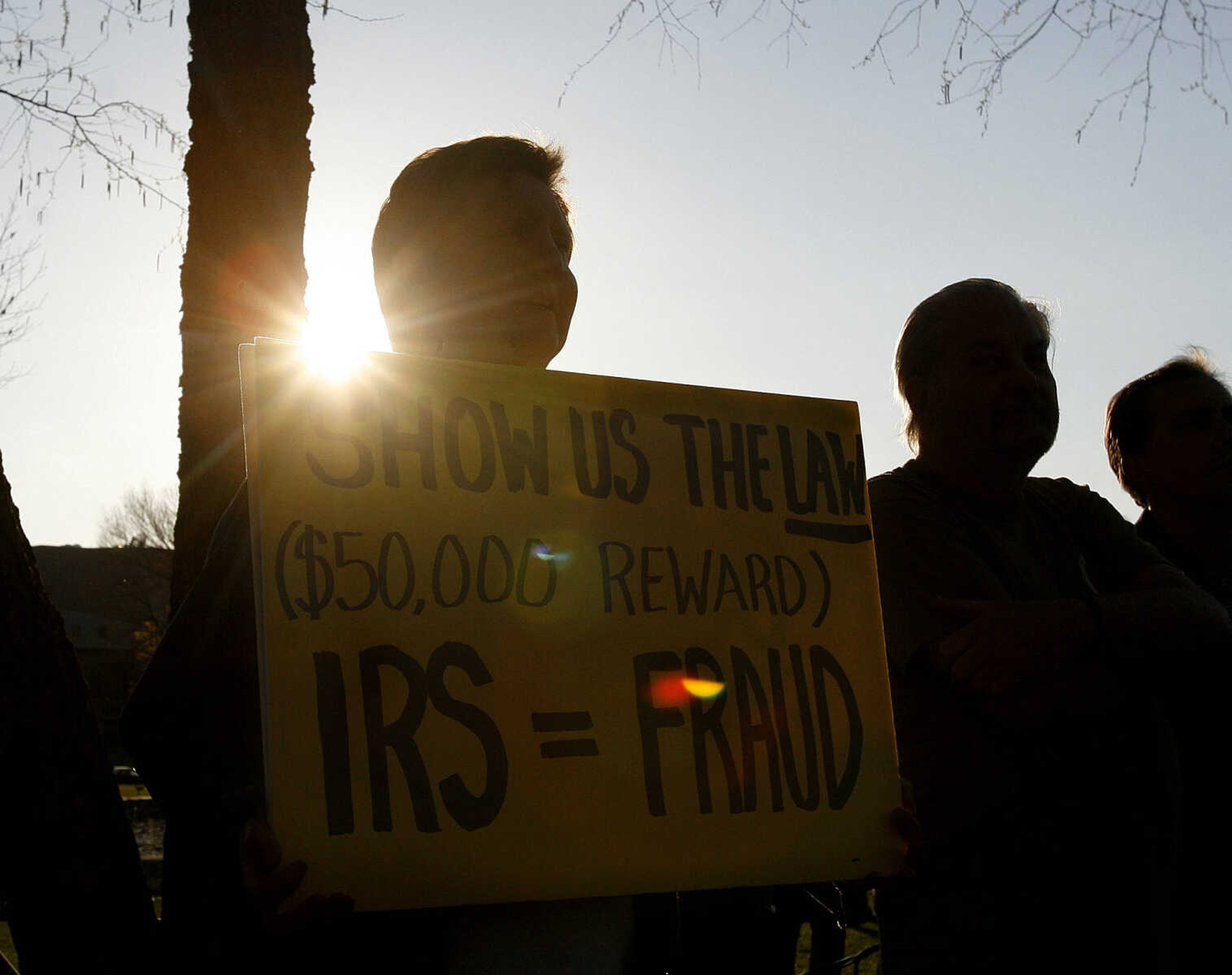 ELIZABETH DODD ~ edodd@semissourian.com
Dan Shandy of Cape Girardeau was one of many members of the crowd displaying signs in protest of what they say is overspending of the federal government.