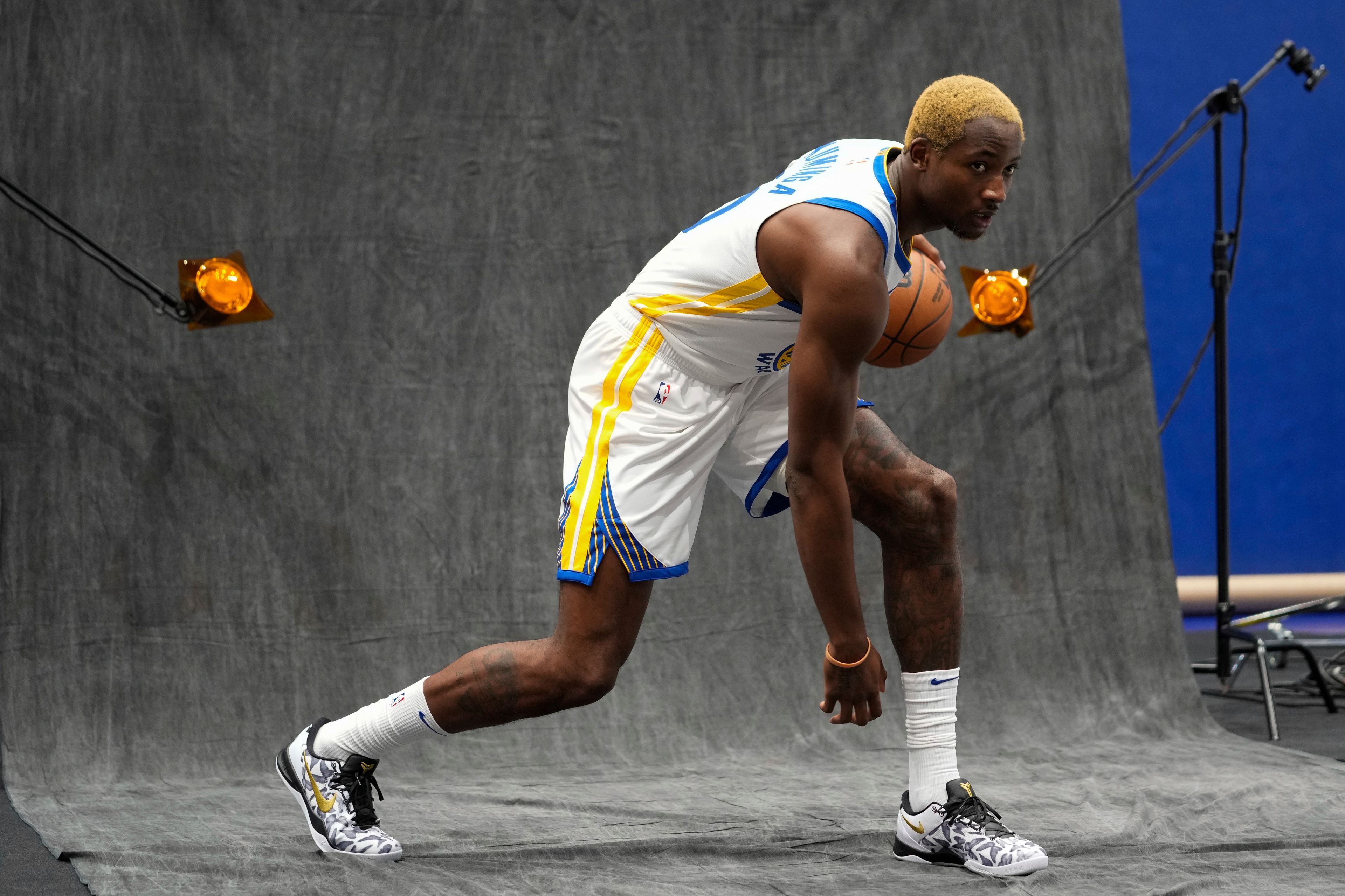 Golden State Warriors' Jonathan Kuminga poses for a photograph during the NBA basketball team's media day Monday, Sept. 30, 2024, in San Francisco. (AP Photo/Godofredo A. Vásquez)