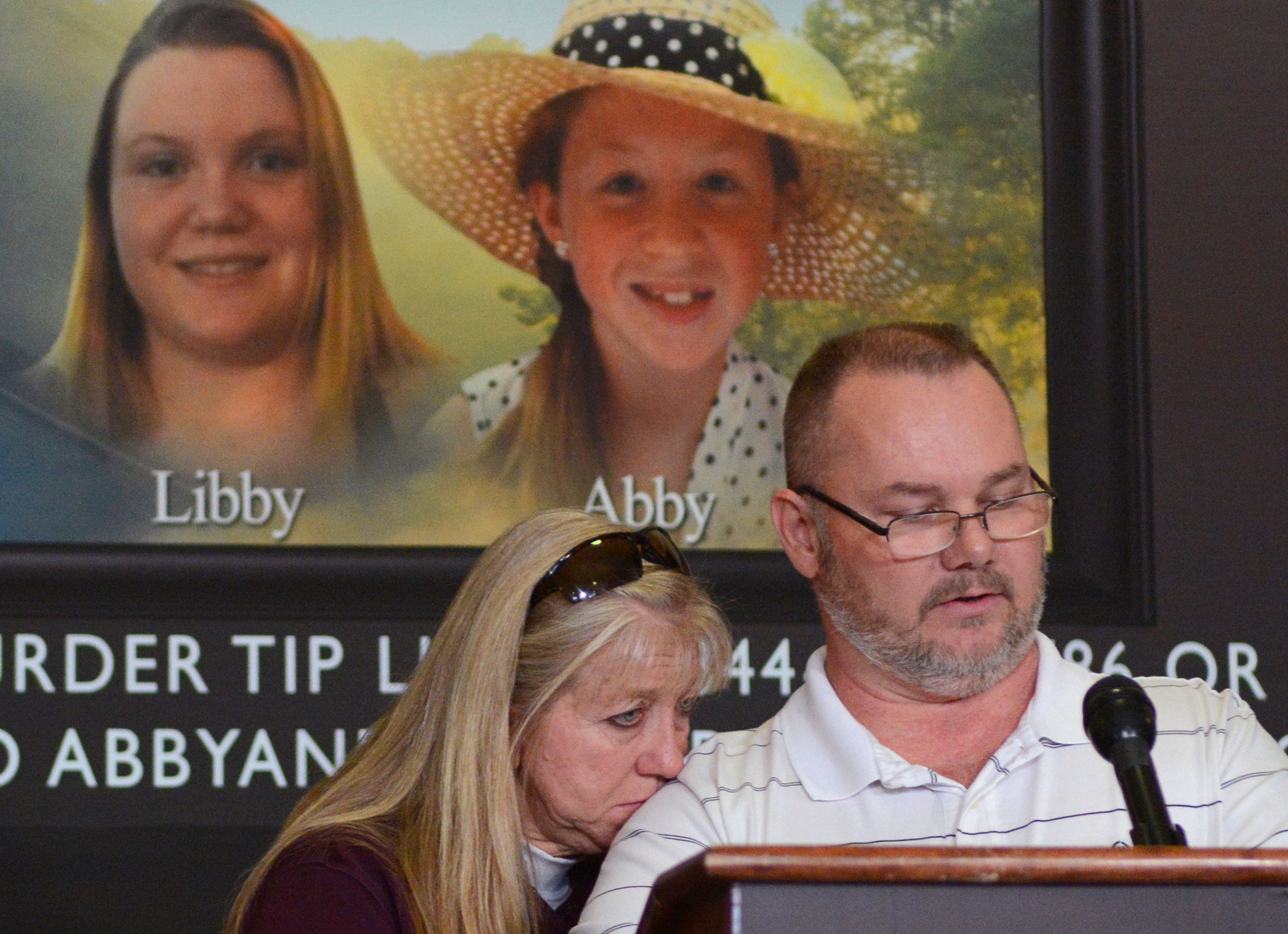 FILE - Grandparents of victim Libby German, Becky Patty, left, and her husband Mike Patty, speak during a news conference for the latest updates on the investigation of the double homicide of Liberty German and Abigail Williams on Thursday, March 9, 2017, at Carroll County Courthouse in Delphi, Ind. (J. Kyle Keener/The Pharos-Tribune via AP, File)