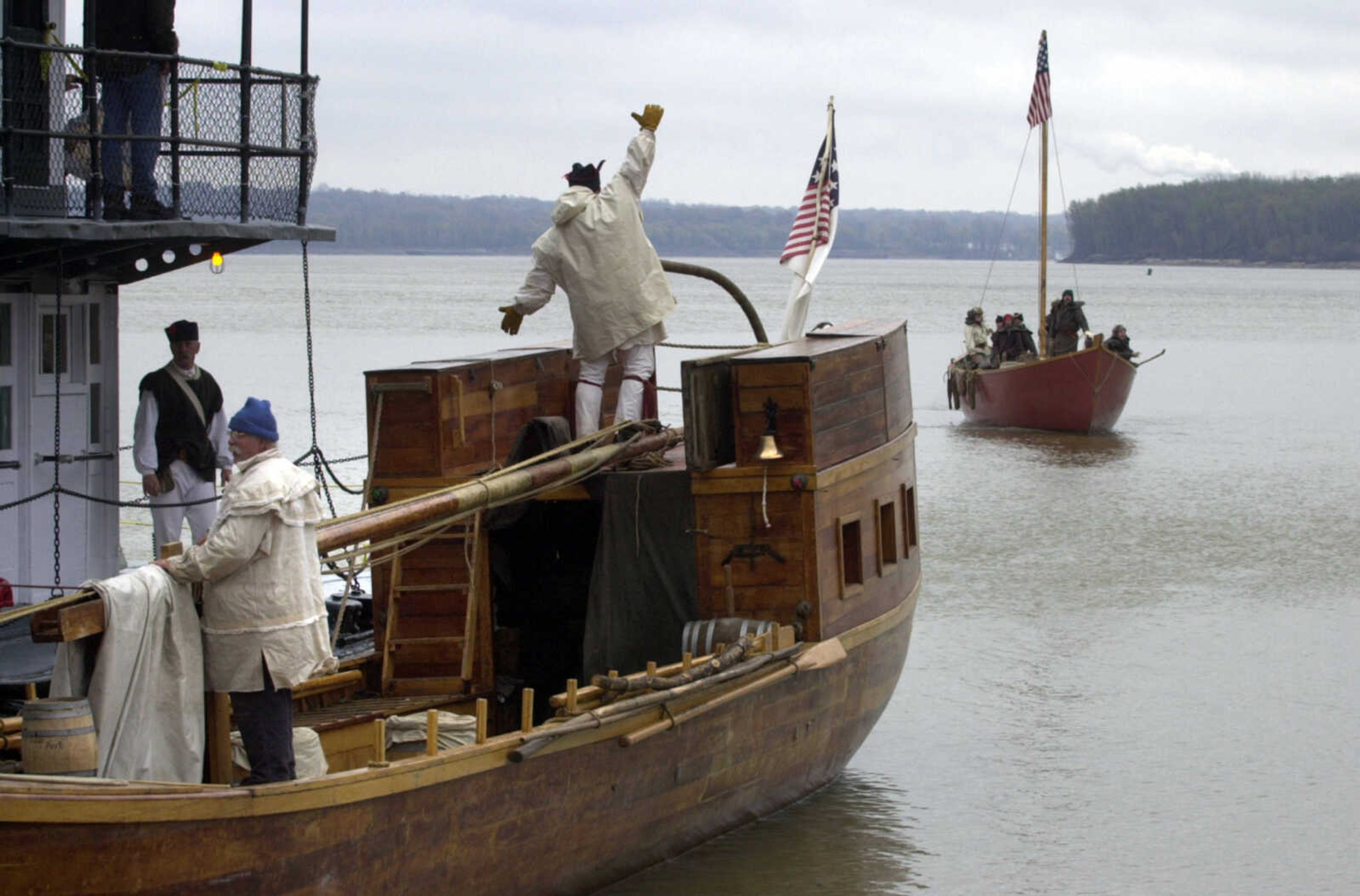 FRED LYNCH ~ flynch@semissourian.com
Corps of Discovery reenactors aboard a replica keelboat arrived at Fort Defiance State Park at Cairo, Ill. Saturday, Nov. 15, 2003, just ahead of reenactors aboard a pirogue, at right. Both tied up at the end of the Ohio River near the confluence with the Mississippi River after a five-hour trip from Fort Massac State Park at Metropolis, Ill.