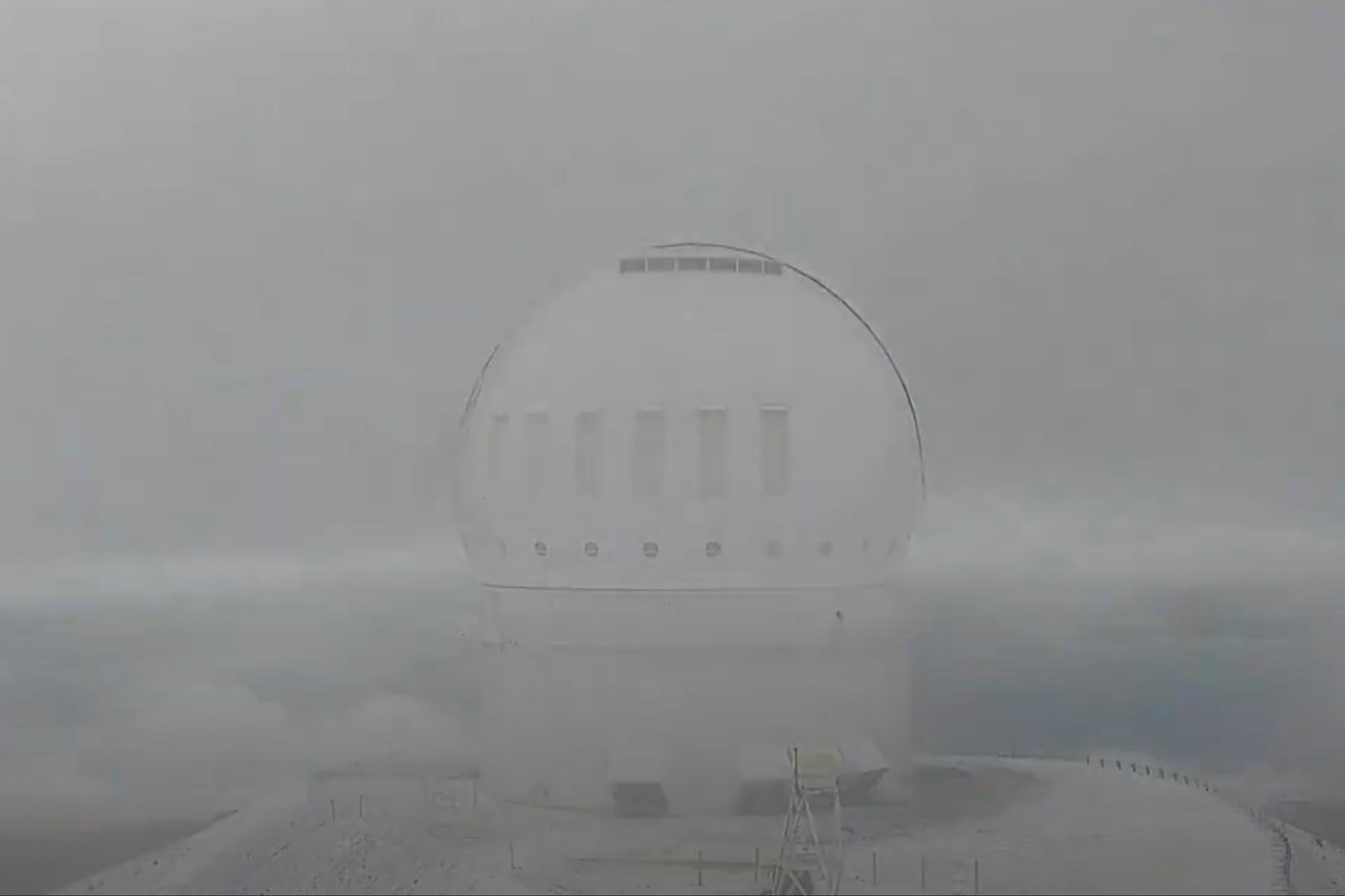 This image made from video provided by Canada-France-Hawai’i Telescope, shows snow on the summit of Mauna Kea in Hawaii on Sunday, Oct. 27, 2024. (Canada-France-Hawai’i Telescope via AP)