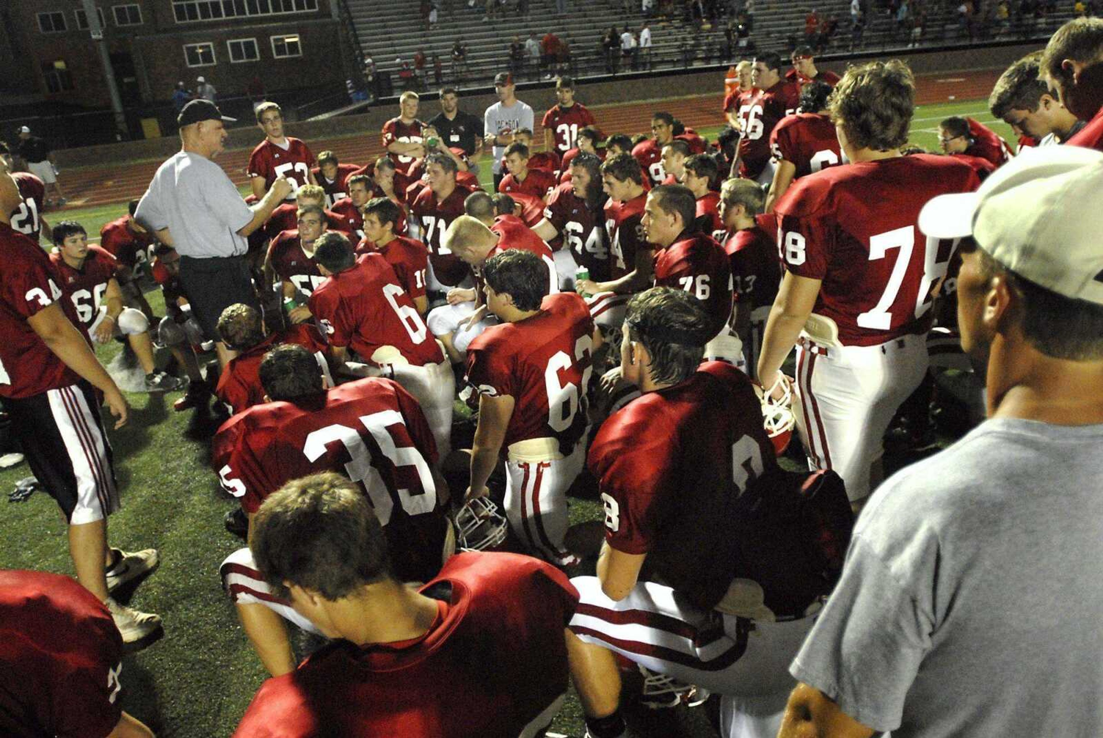 Jackson coach Van Hitt talks with his team during Friday's jamboree in Farmington, Mo. (Kristin Eberts)