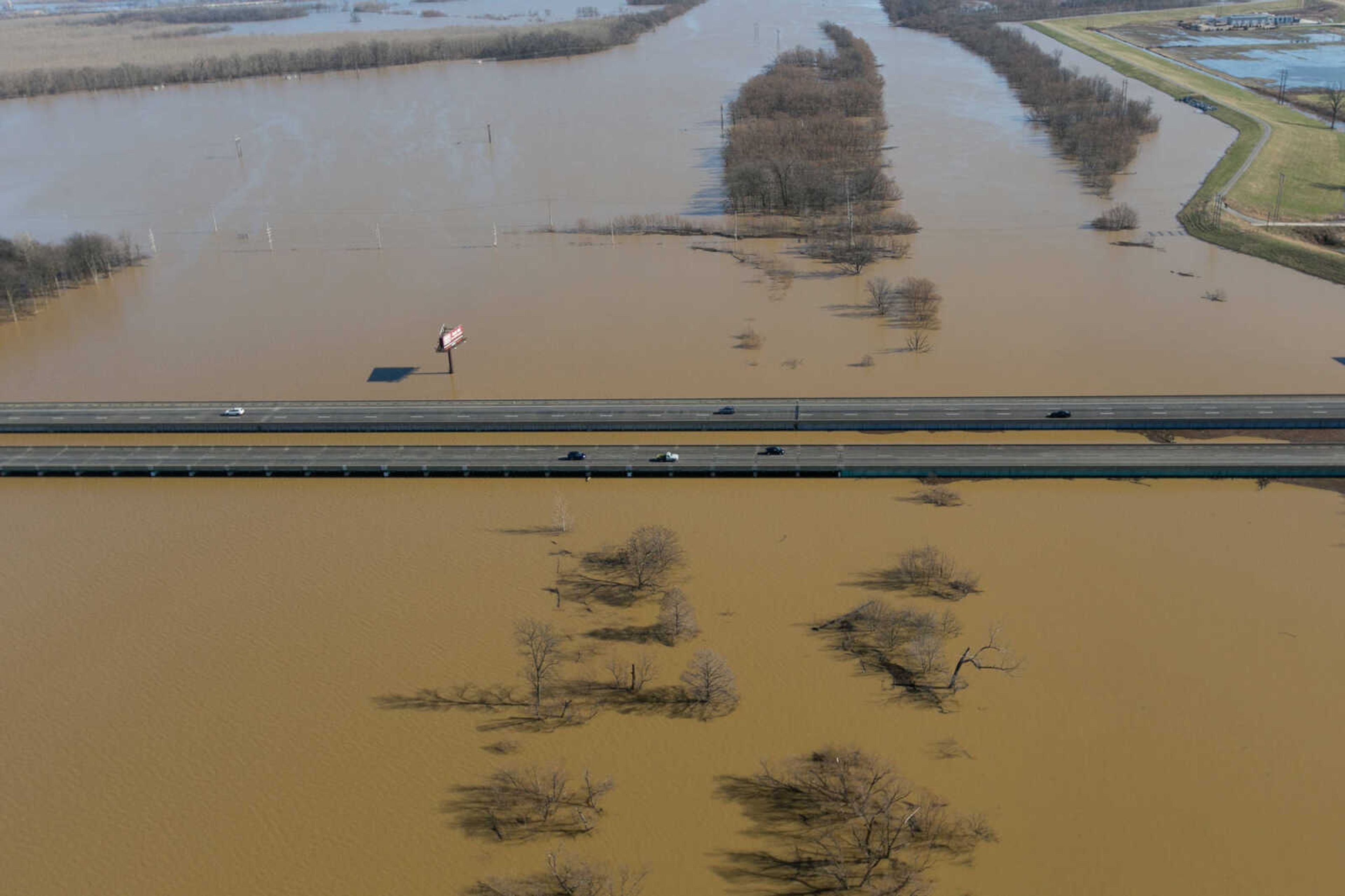 GLENN LANDBERG ~ glandberg@semissourian.com

Floodwater from the Diversion Channel spreads across the horizon near Cape Girardeau, Saturday, Jan. 2, 2016.