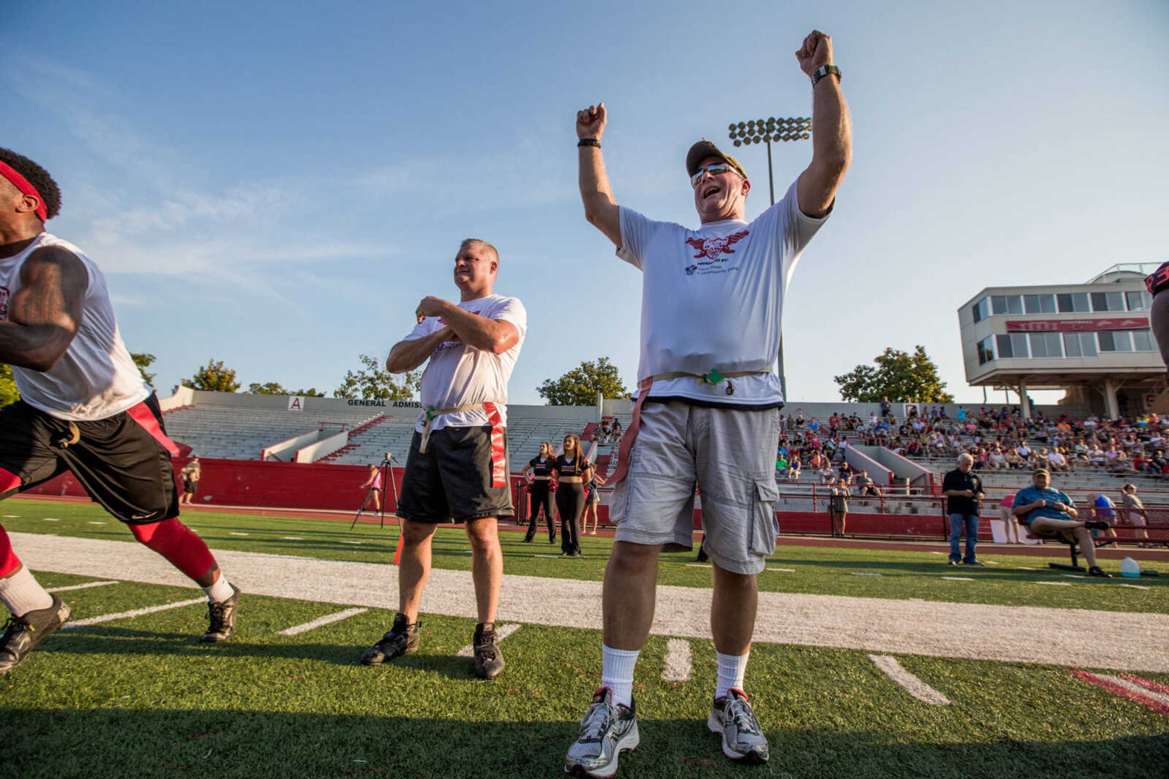 GLENN LANDBERG ~ glandberg@semissourian.com

Jay Wittenborn, a member of the Illinois State Police, celebrates as his team wins the Cops and Hawks Bowl Thursday, July 21, 2016 at Houck Stadium. The flag-football game was a fundraiser for the family members of those who have lost their lives in the line of duty.