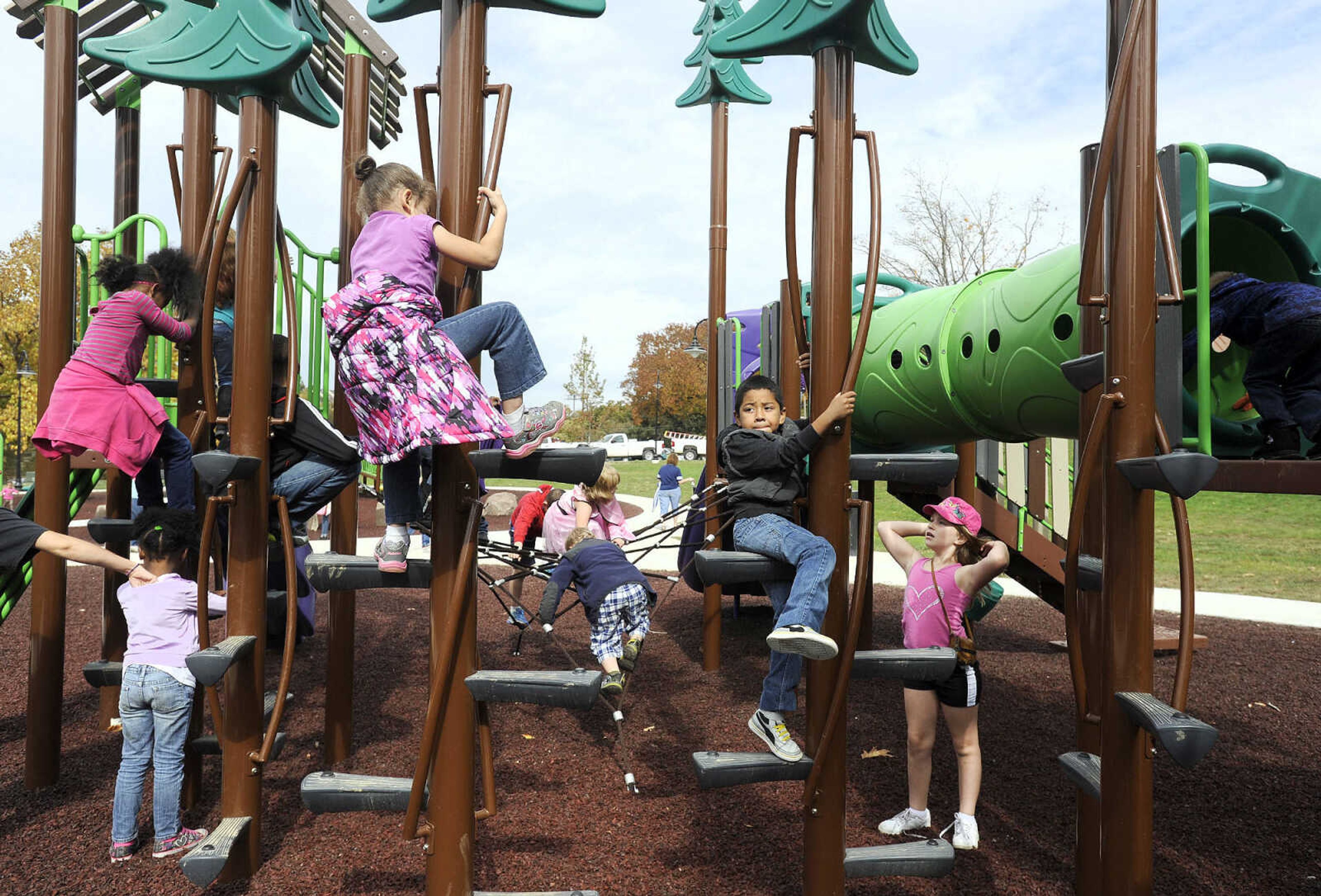 LAURA SIMON ~ lsimon@semissourian.com

Children test out the new playground at Capaha Park, Friday, Oct. 23, 2015, in Cape Girardeau.