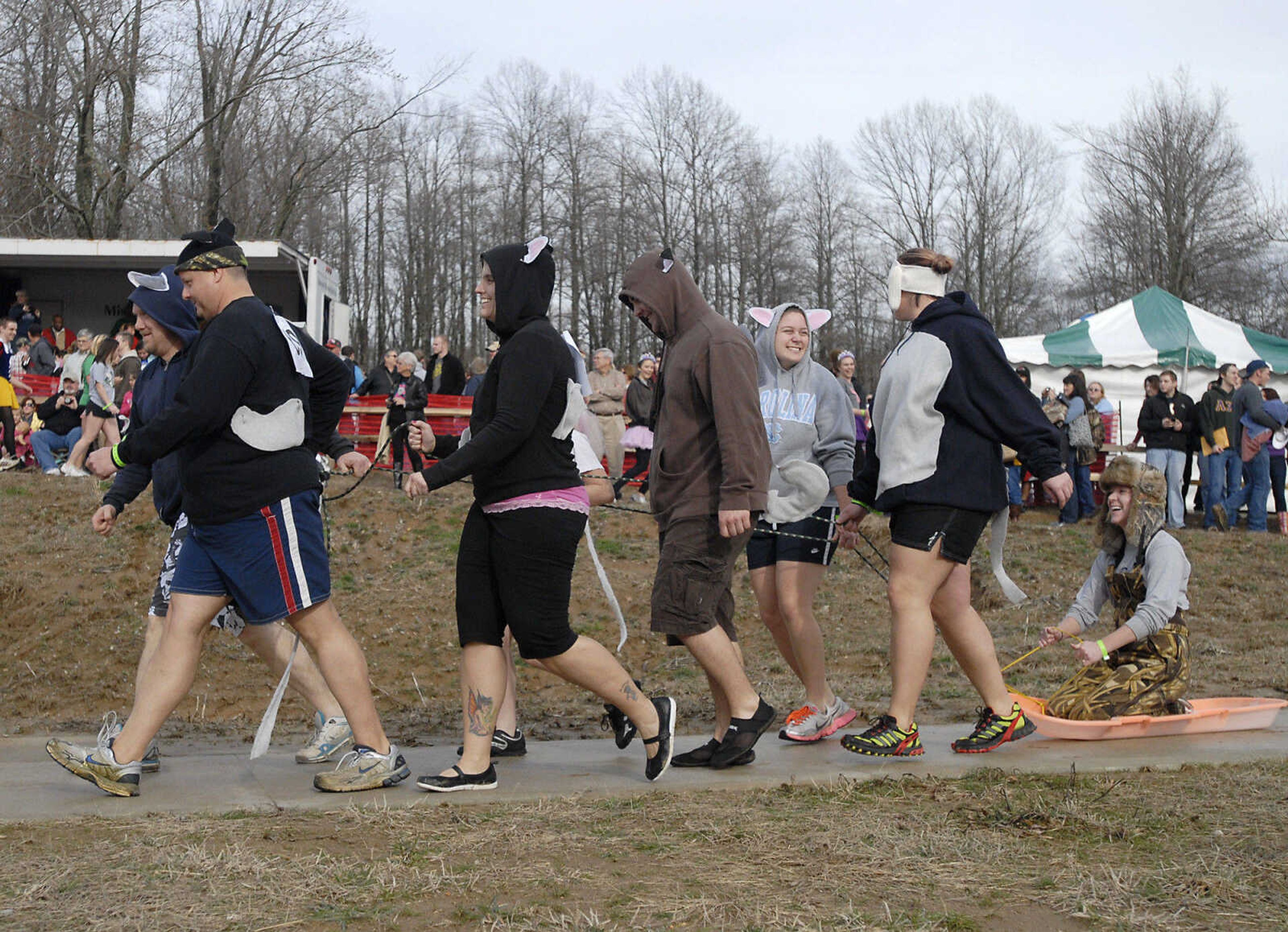 KRISTIN EBERTS ~ keberts@semissourian.com

Teams show off their costumes in a parade during the 2012 Polar Plunge at the Trail of Tears State Park's Lake Boutin on Saturday, Feb. 4, 2012.