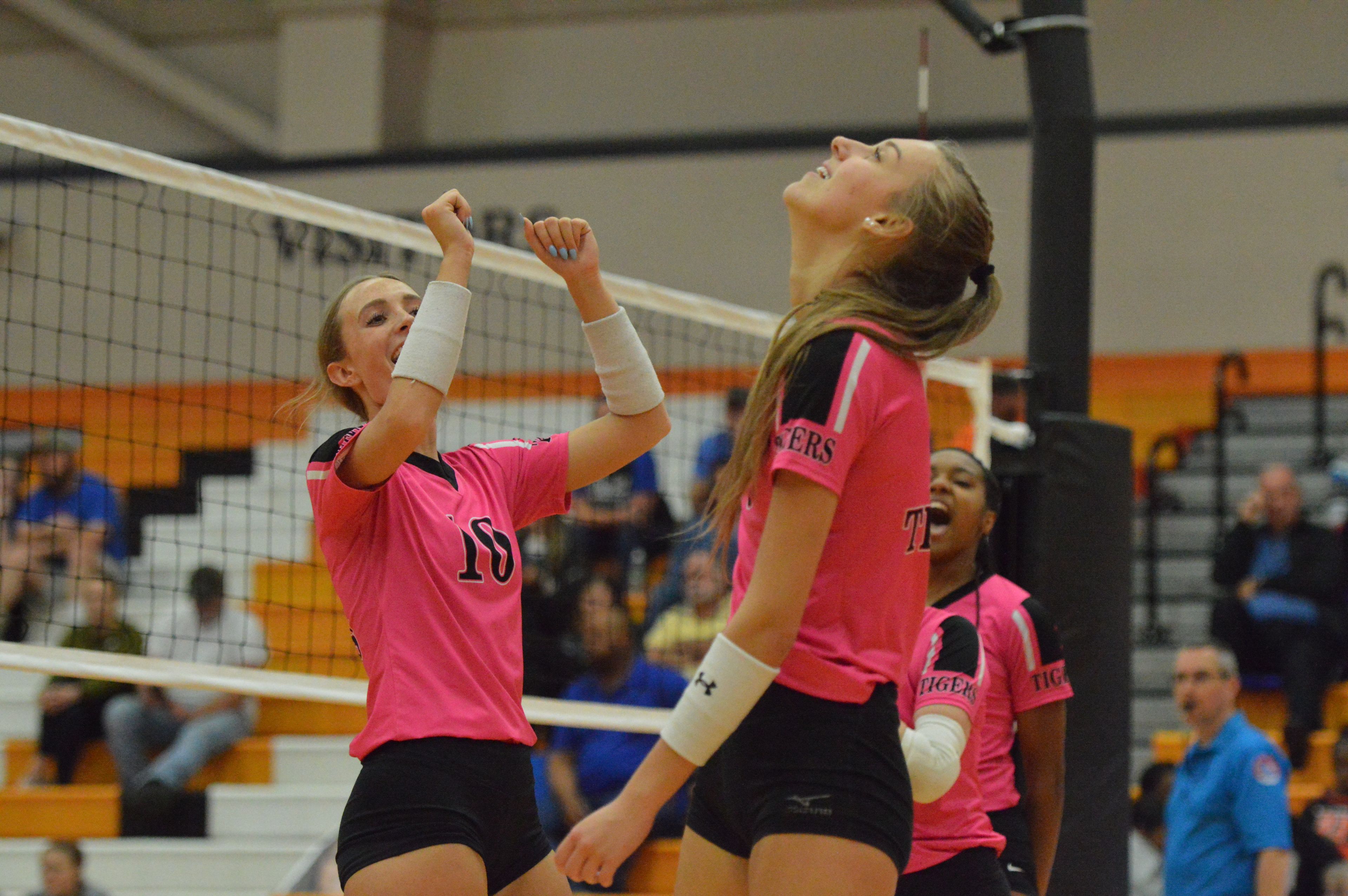 Cape Central volleyball junior Sydney Miller and her Lady Tiger teammates react to her kill against Bernie on Monday, Sept. 16. Cape Central swept the Lady Mules 3-0 to improve to 9-3-1 on the season.