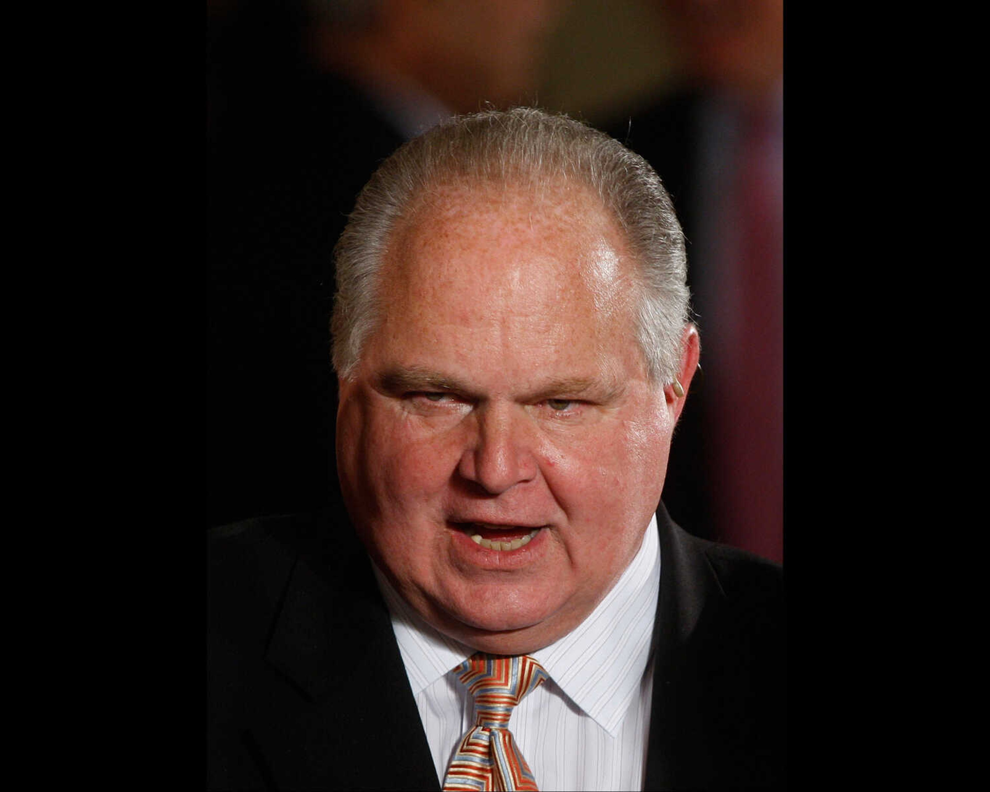 FILE - In this Jan. 13, 2009 file photo, conservative talk show host Rush Limbaugh talks with guests in the East Room of the White House in Washington. (AP Photo/Ron Edmonds, File)