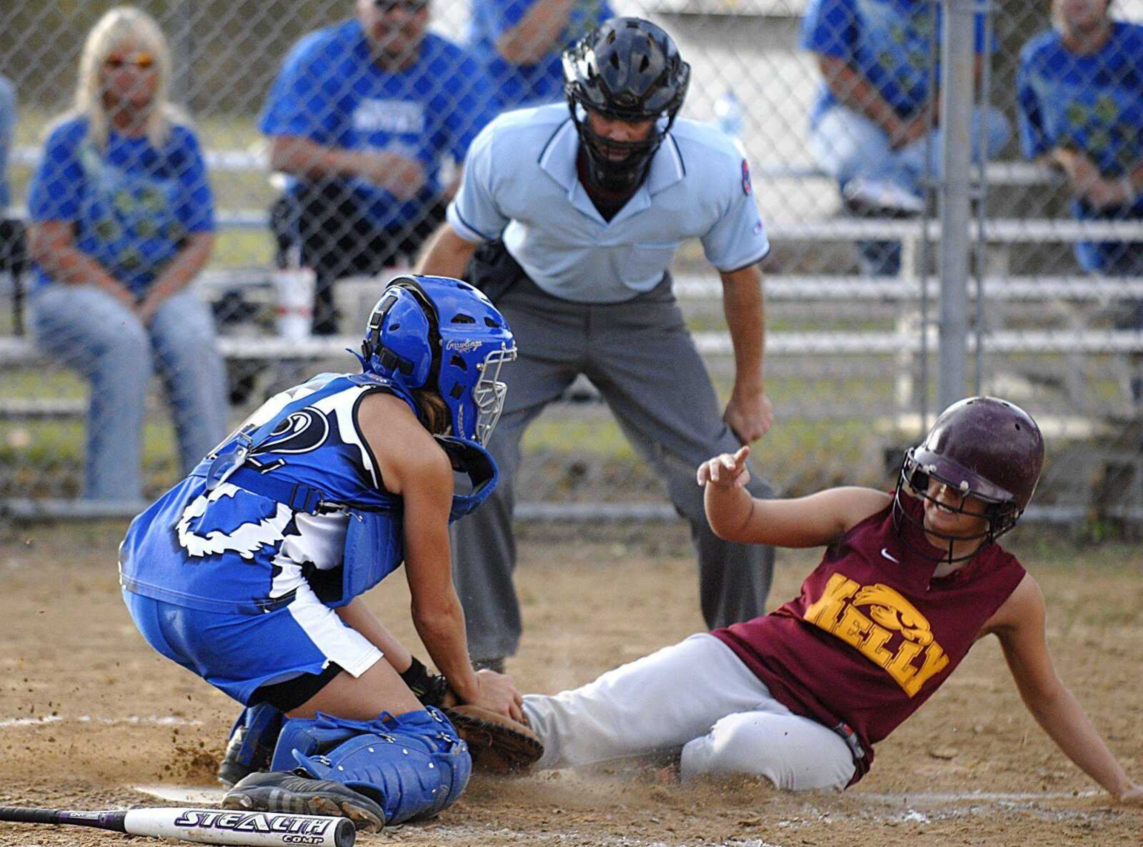 AARON EISENHAUER ~ aeisenhauer@semissourian.com
Kelly's Heather Beggs slides safely under the tag of Twin Rivers catcher Kelsey Snider during the fourth inning of their Class 2 sectional game Tuesday in Benton.