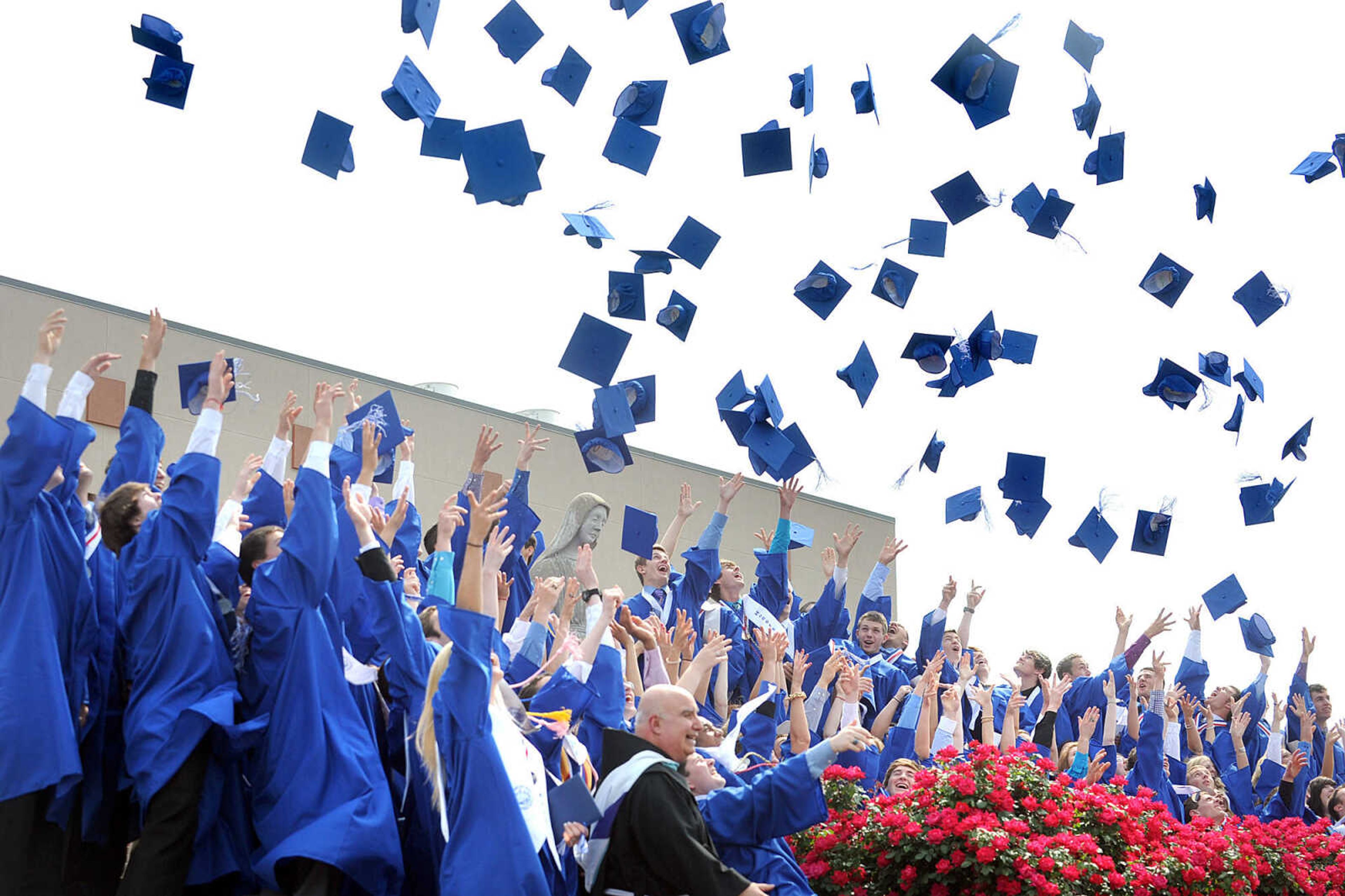 LAURA SIMON ~ lsimon@semissourian.com

The eighty-fifth graduating class of Notre Dame Regional High School throw their hats in the air, Sunday, May 19, 2013, in celebration of their commencement.