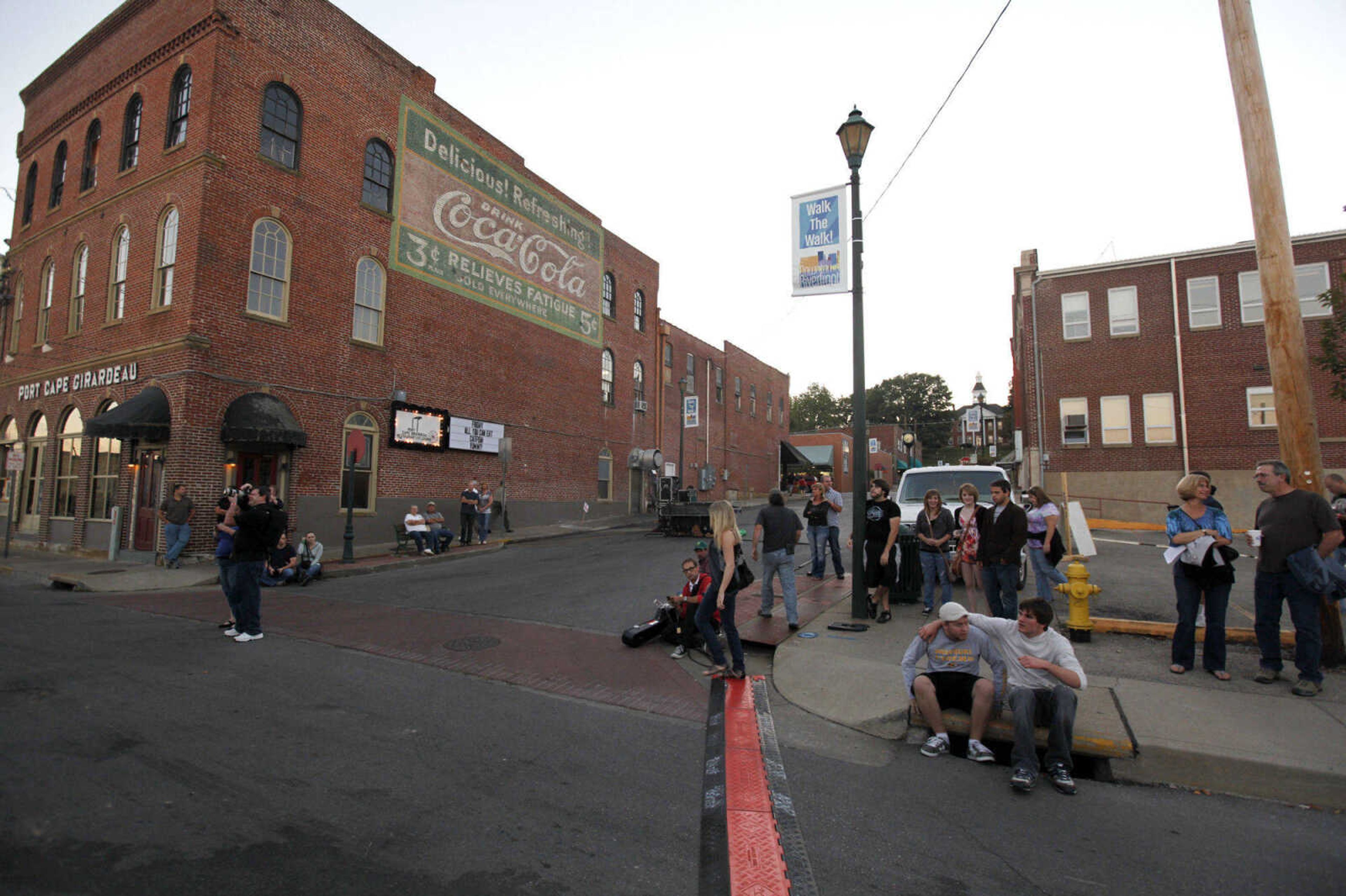 CHRIS MACKLER ~ photos@semissourian.com

Patrons fill Water Street to watch Jeremy Stanfill and Grace Askew perform on the main stage at the 14th annual River City Music Festival held in downtown Cape Girardeau on Friday, Oct. 1, 2010.