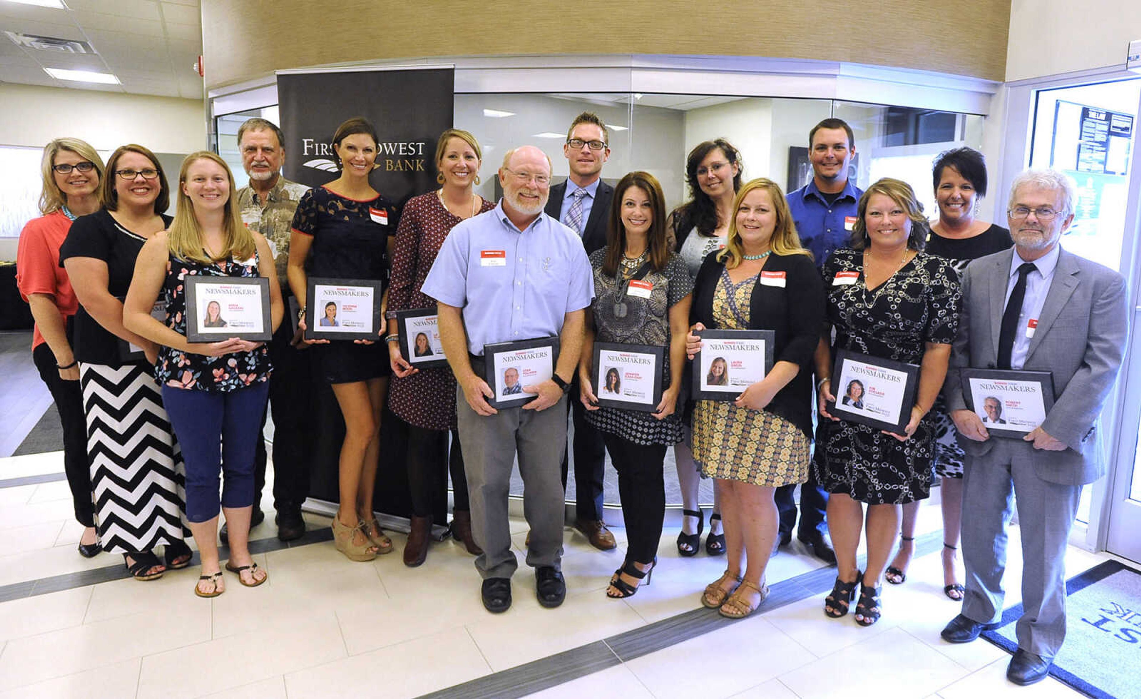 FRED LYNCH ~ flynch@semissourian.com
Recipients of the 2016 Business Today Newsmakers awards pose for a photo Wednesday, Sept. 7, 2016 at First Midwest Bank in Cape Girardeau.