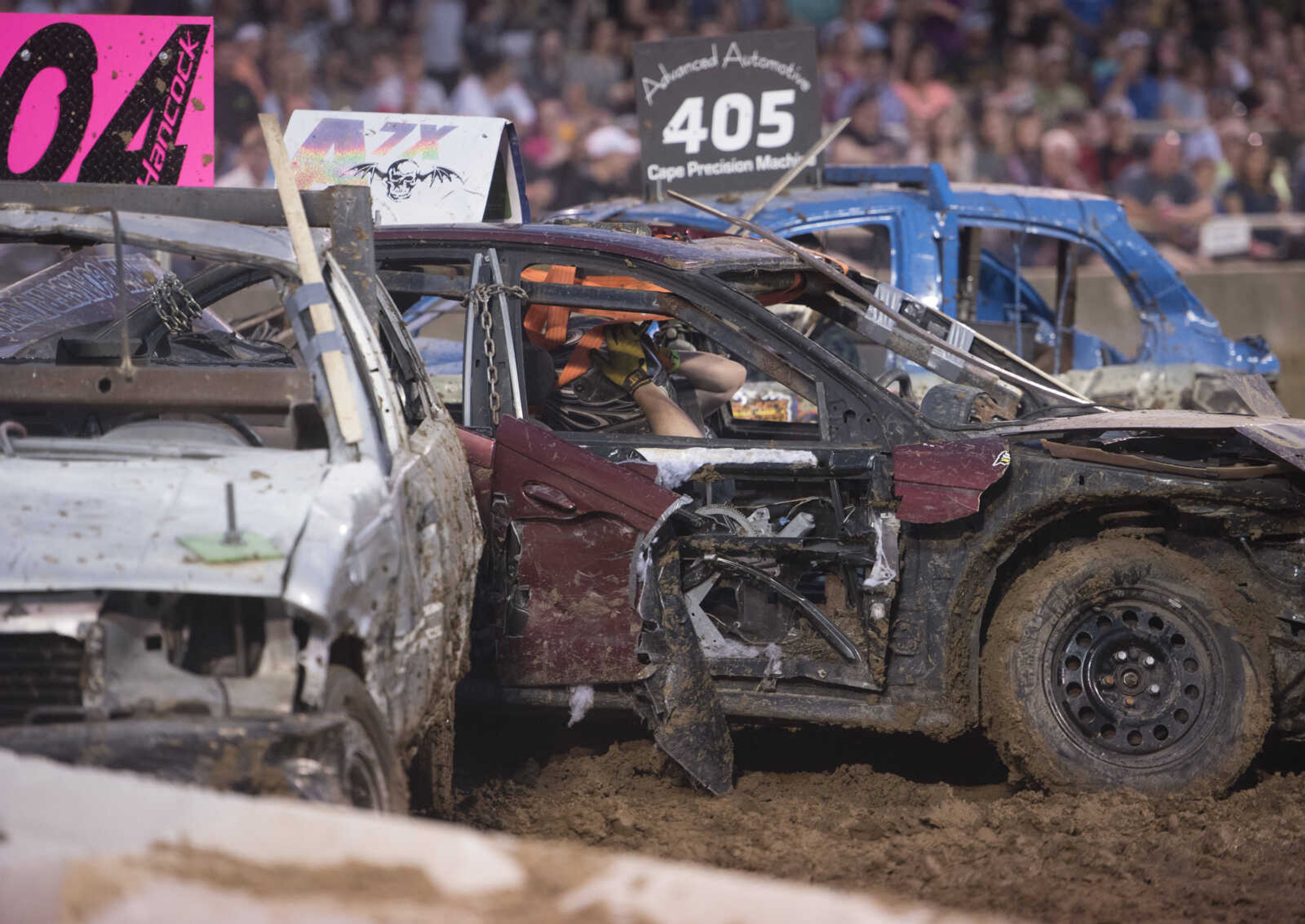 A car takes a hit during the Auto Tire & Parts Dual Demo Derby September 9, 2017, at the SEMO District Fair in Cape Girardeau.