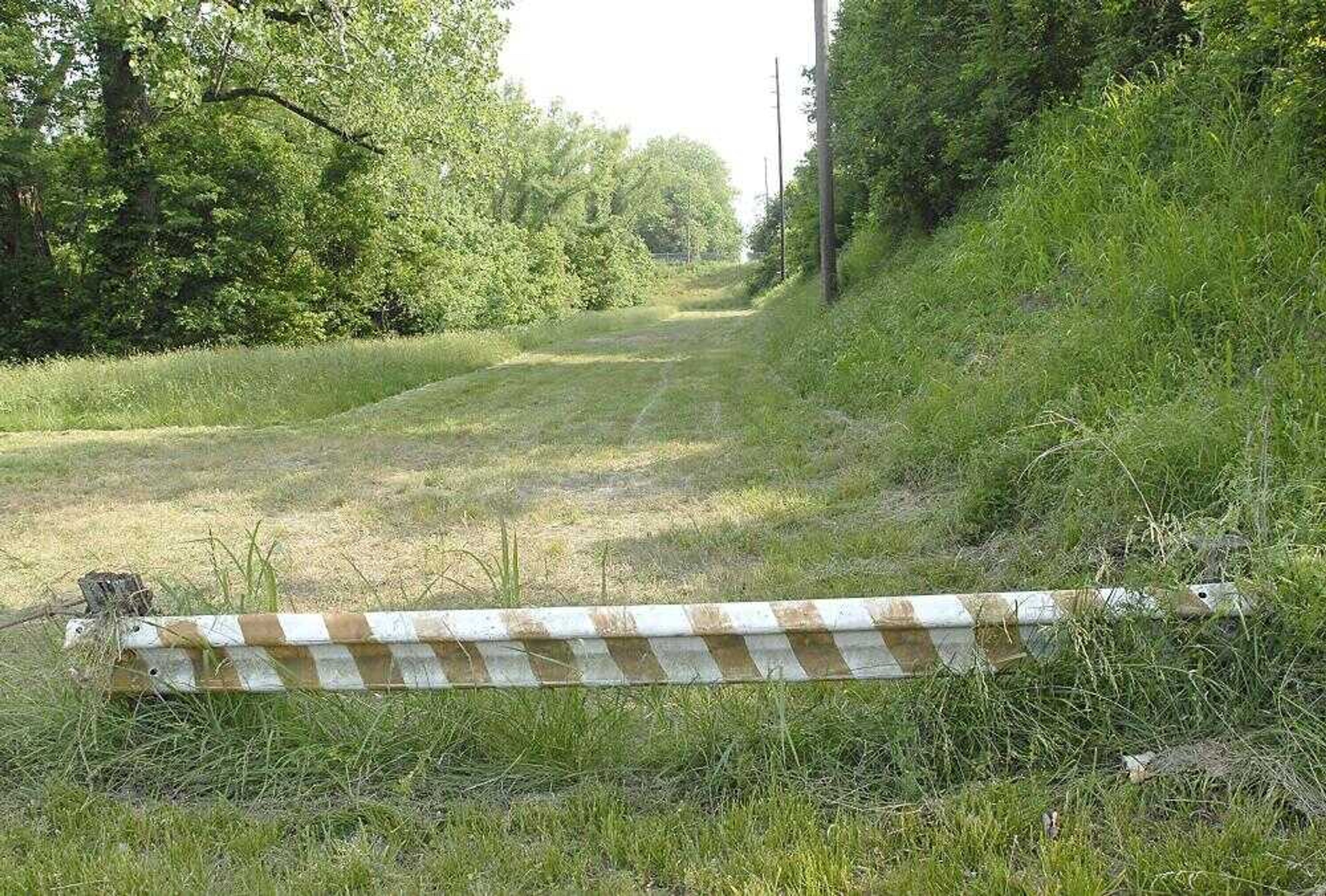 This old railroad bed between William and Good Hope streets will be part of the Fountain Street extension project made possible with a $400,000 Community Development Block Grant announced by Gov. Matt Blunt Wednesday. The extension will continue to Morgan Oak Street at the River Campus. (Fred Lynch)