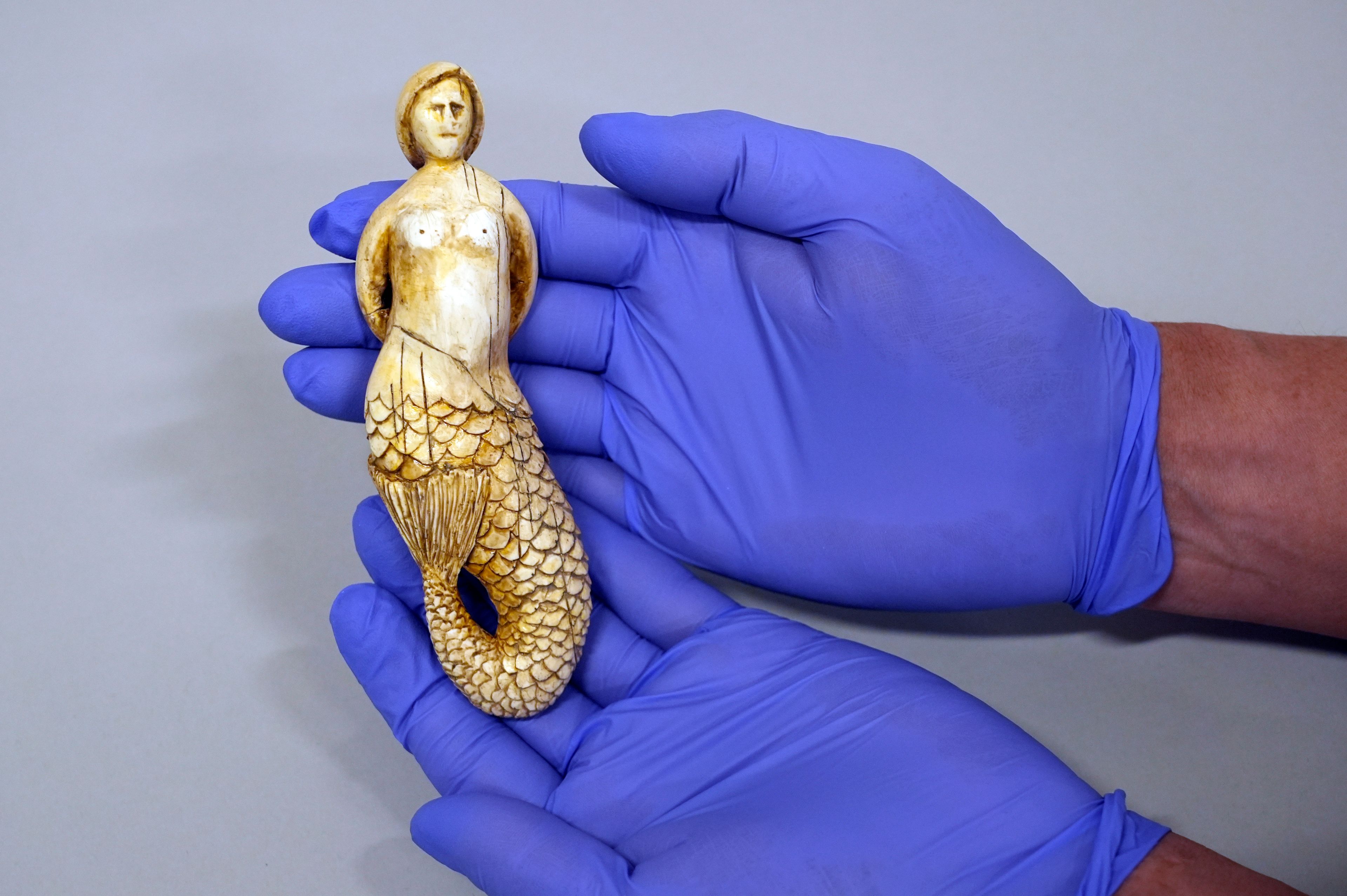 A carved mermaid figurine from the 2019 film "The Lighthouse" is pictured on Tuesday, Oct. 29, 2024, at the Pickford Center for Motion Picture Study in Los Angeles. (AP Photo/Chris Pizzello)