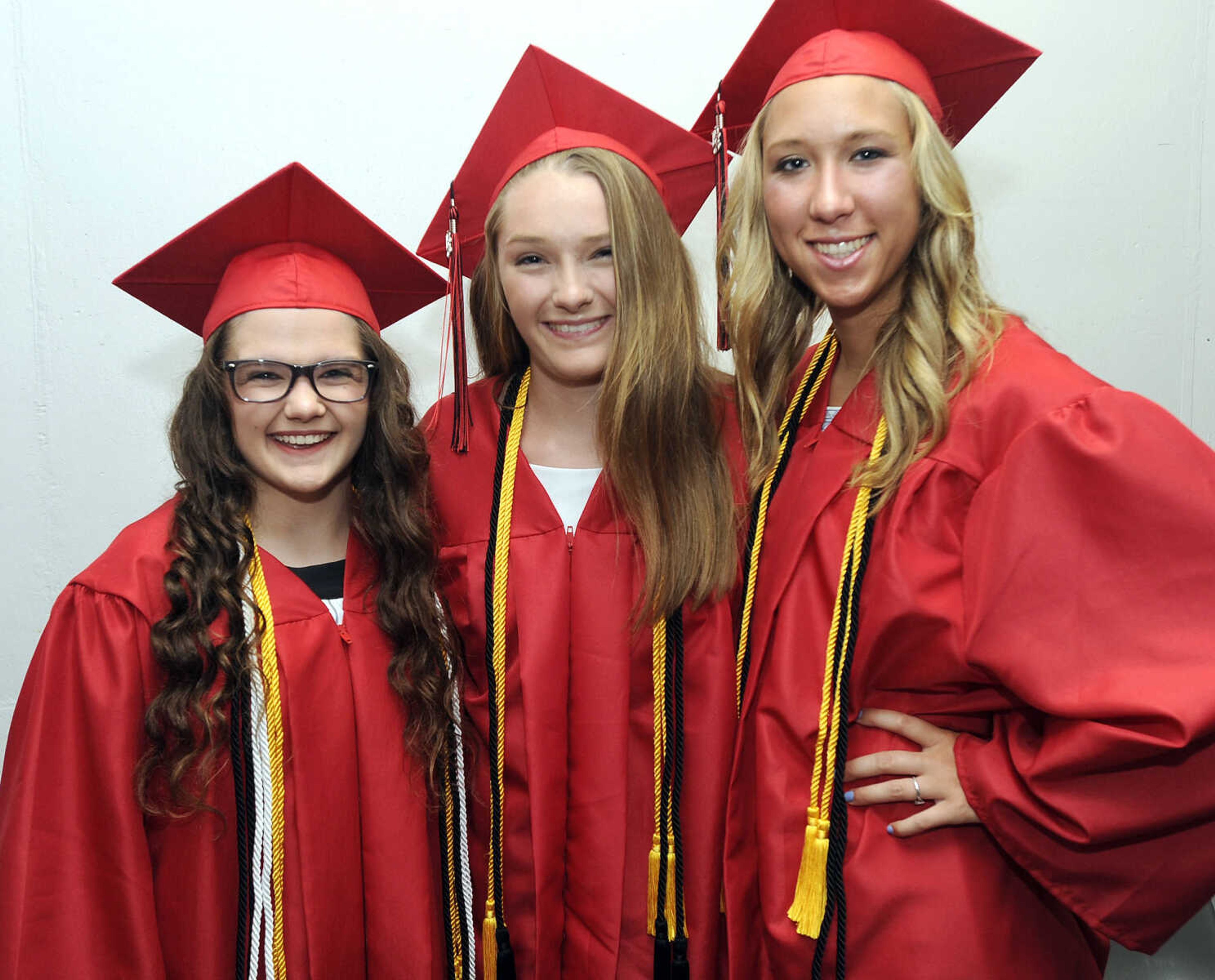 FRED LYNCH ~ flynch@semissourian.com
Hannah Summers, left, Katie Schumer and Abigail Sadler pose for a photo before the Jackson High School commencement Friday, May 18, 2018 at the Show Me Center.