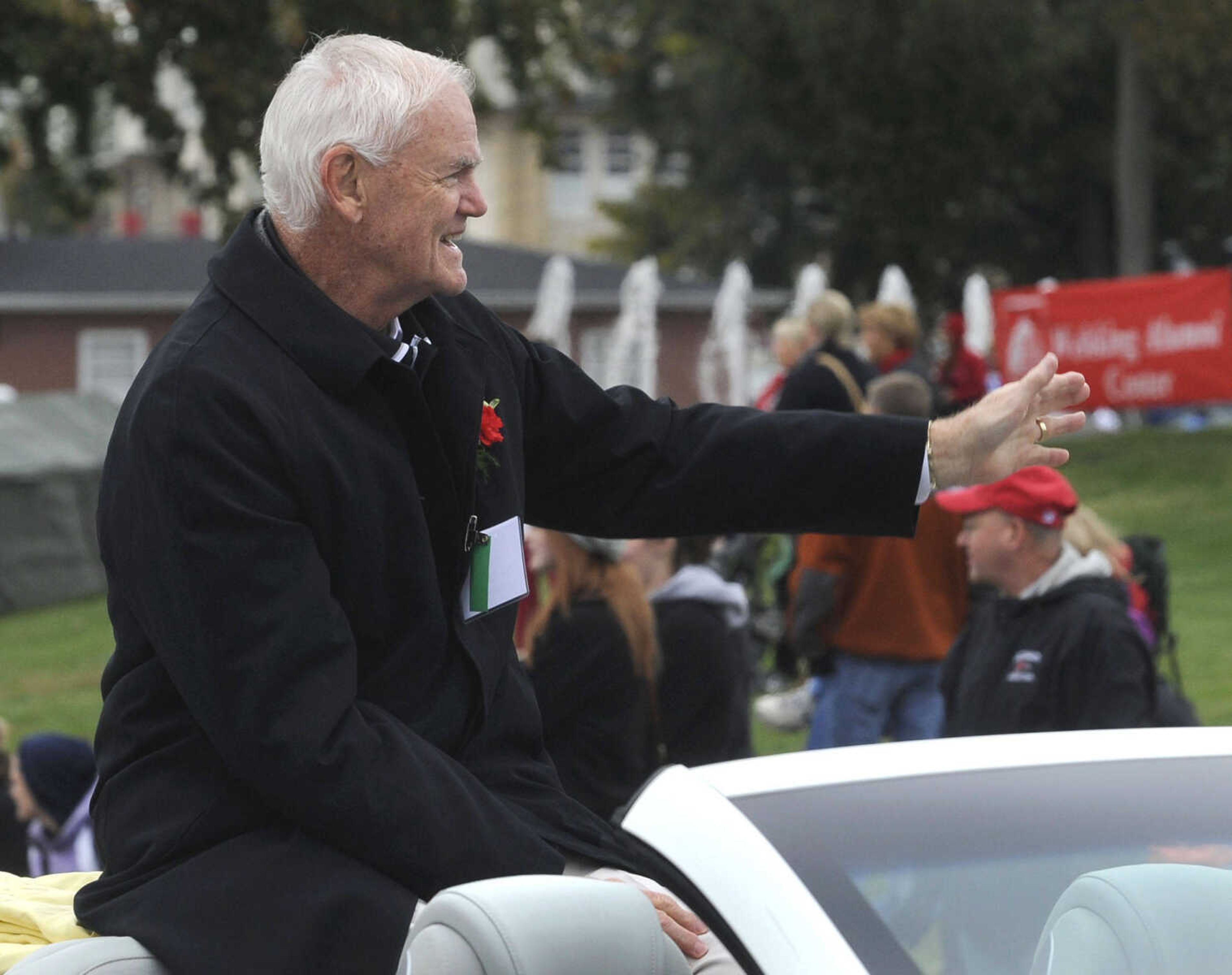 FRED LYNCH ~ flynch@semissourian.com
Bill Stacy, a former president of Southeast Missouri State University from 1980-1989, serves as a parade marshal for the SEMO Homecoming Saturday, Oct. 26, 2013.