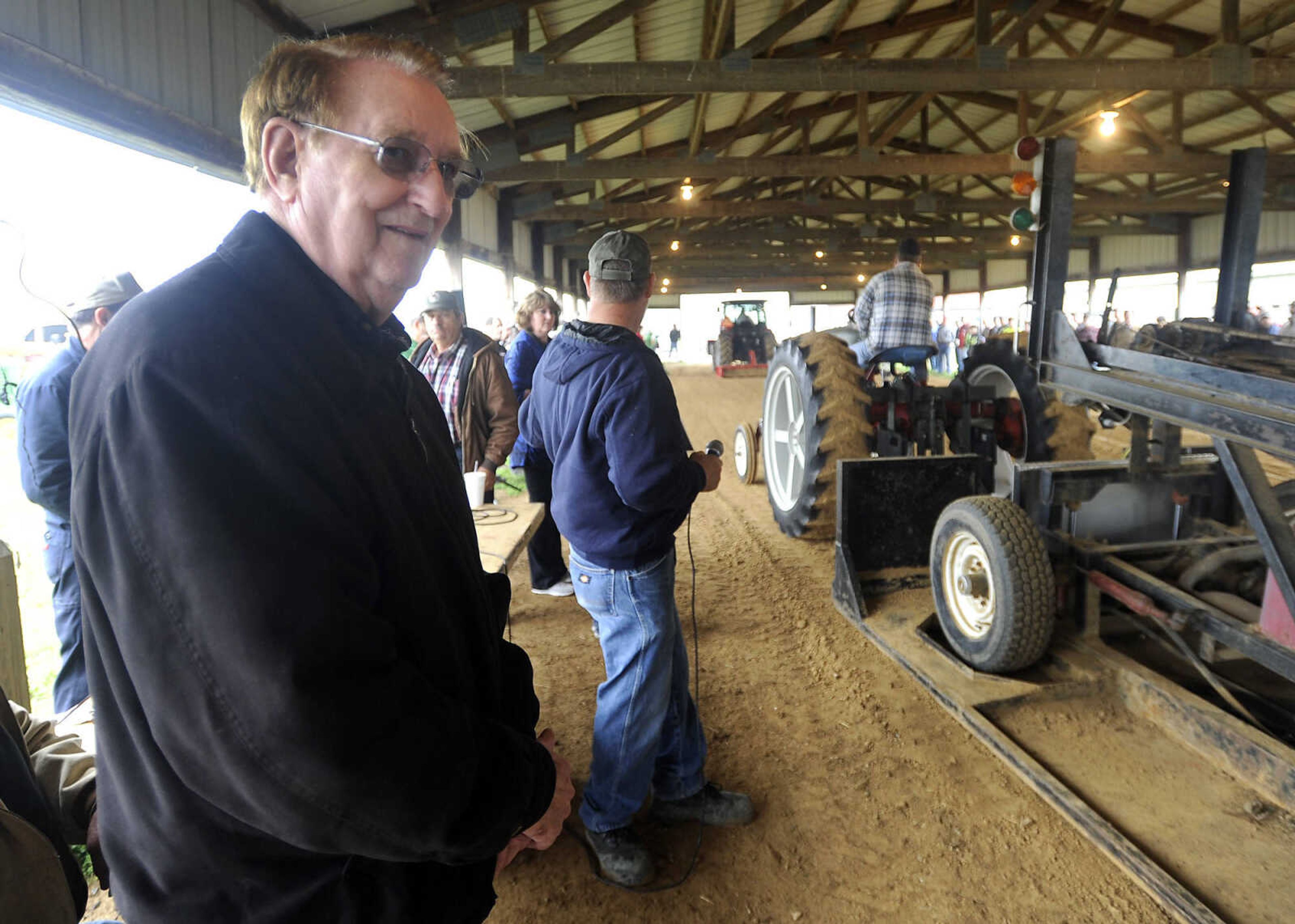 FRED LYNCH ~ flynch@semissourian.com
Bill Anderson, aka Cousin Carl, watches the tractor pull at the Cousin Carl Farm Show on Saturday, March 12, 2016 at Arena Park.