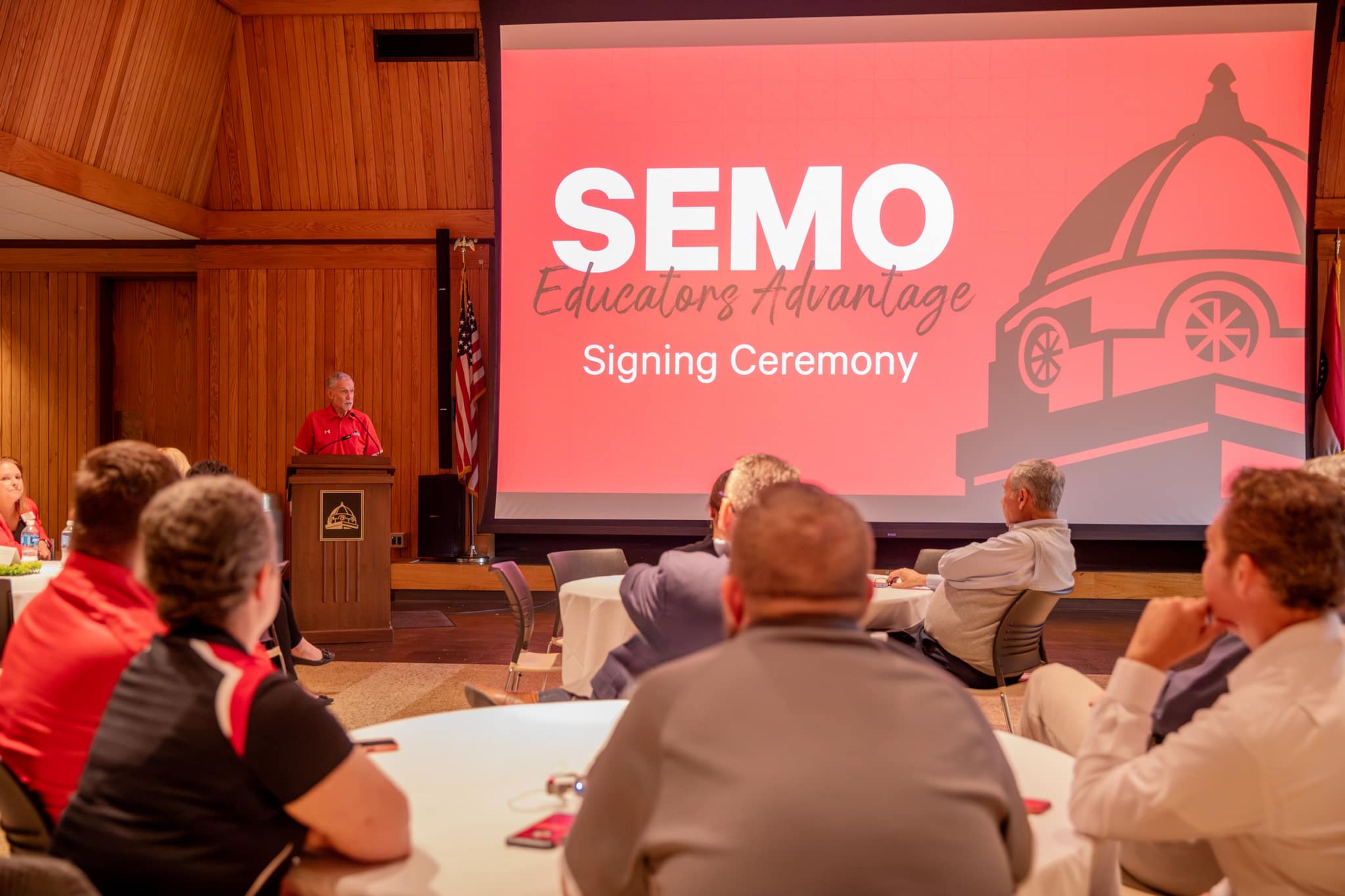 Southeast Missouri State University president Carlos Vargas addresses the audience at a signing ceremony for new Educators Advantage partner school districts. 