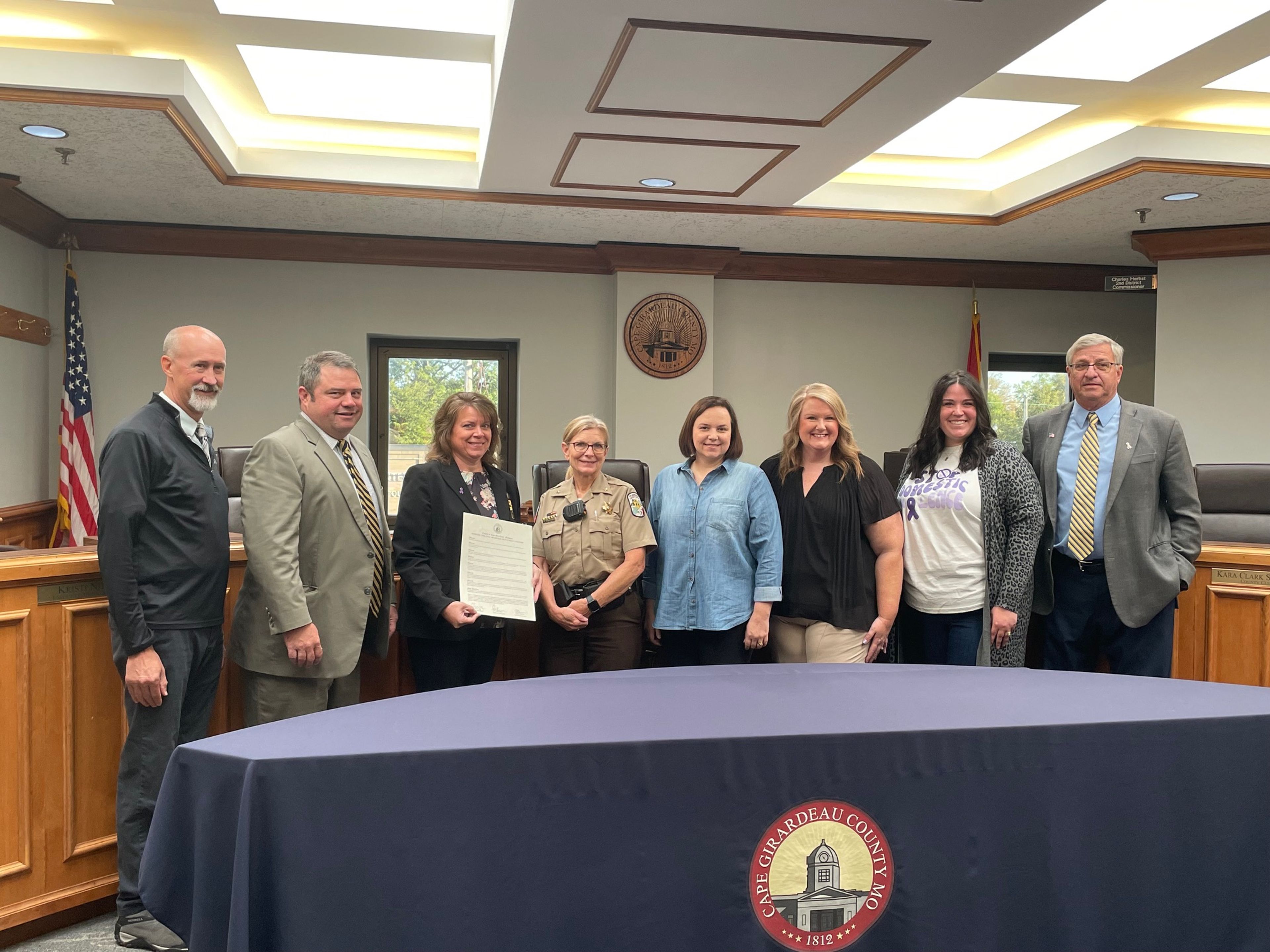 The Cape Girardeau County Commission approved a proclamation honoring Domestic Violence Awareness Month in the county during its Thursday, Oct. 10, meeting. Cpl. Jaime Holloway, third from right, read aloud the proclamation for the commissioners. 