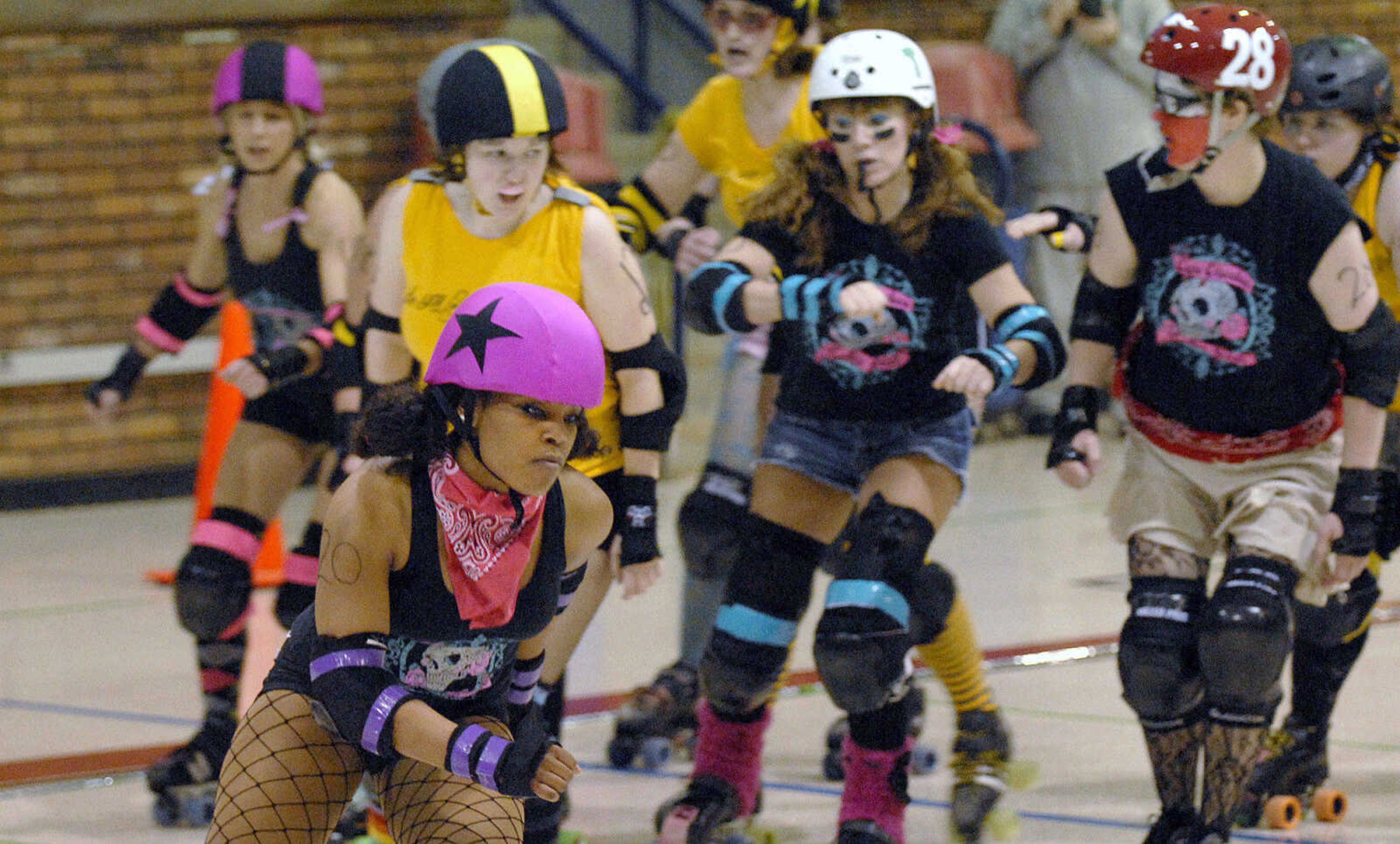 LAURA SIMON~lsimon@semissourian.com
The Cape Girardeau Roller Girls take on the Southern Illinois Roller Girls Saturday, February 26, 2011 during  Riot at the CG Corral at the A.C. Brase Arena Building in Cape Girardeau.