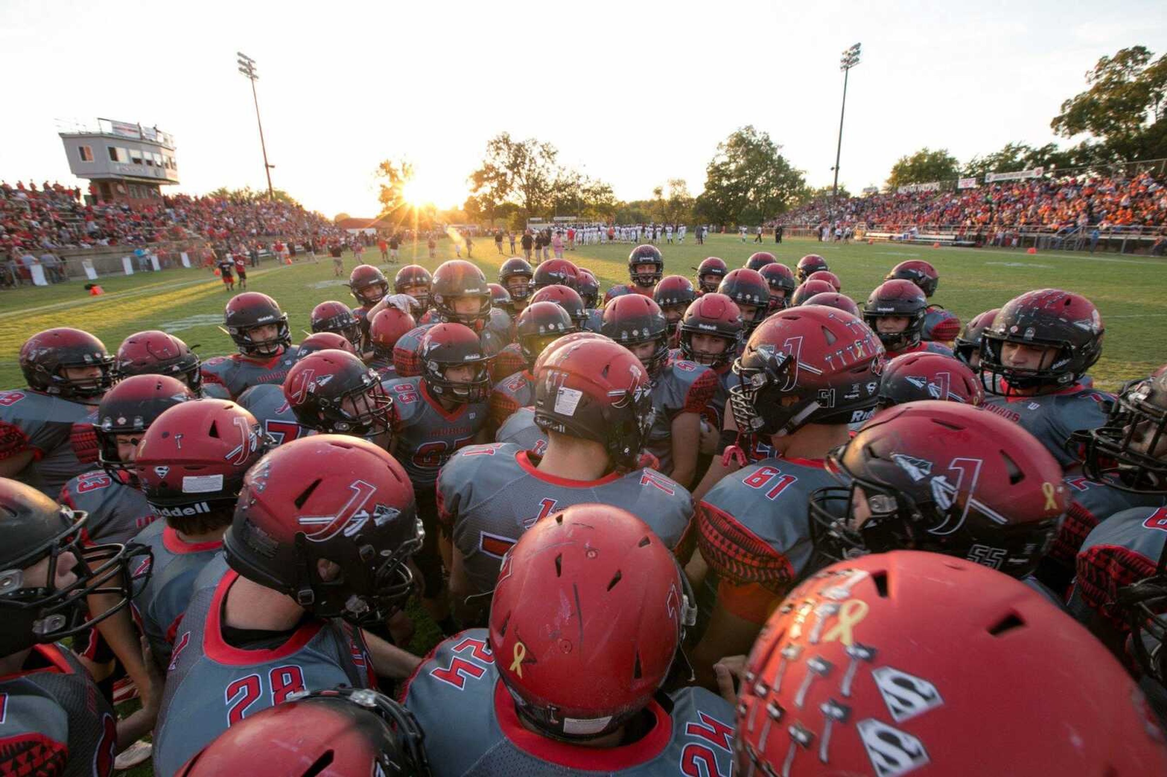 Jackson players huddle together at the start of the game against Cape Central Friday, Sept. 25, 2015 at Jackson High School.