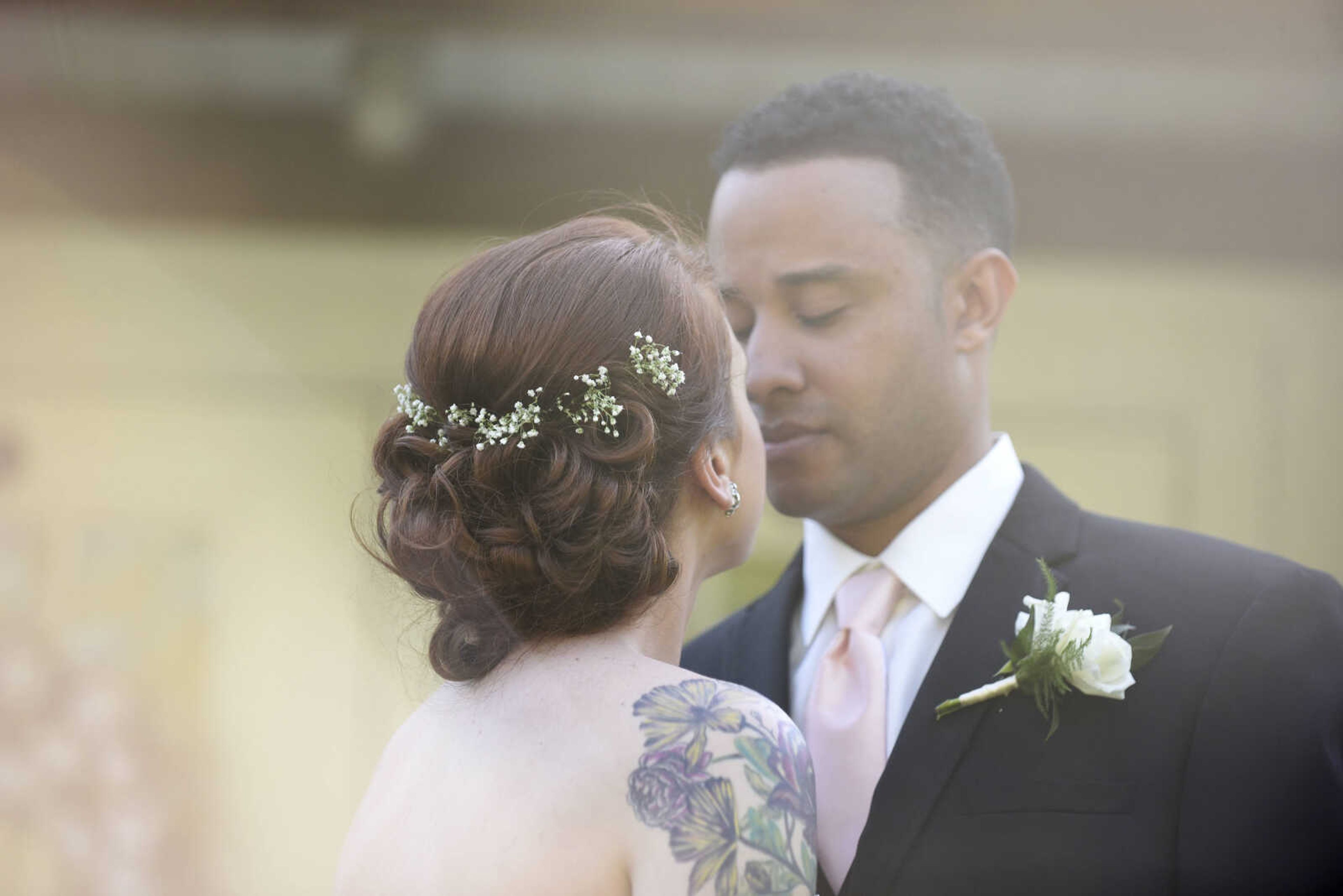 Alvina Valenta: Style 9656 
Ivory lace trumpet bridal gown with a strapless neckline and sheer lace back. Available at Magnolias Bridal Boutique in Cape Girardeau.

Earrings: Lindsay Marie Design : Style "Magnolia"


Wedding suits courtesy of Jim's Formal Wear and available at Garber's Men's Wear in Cape Girardeau.