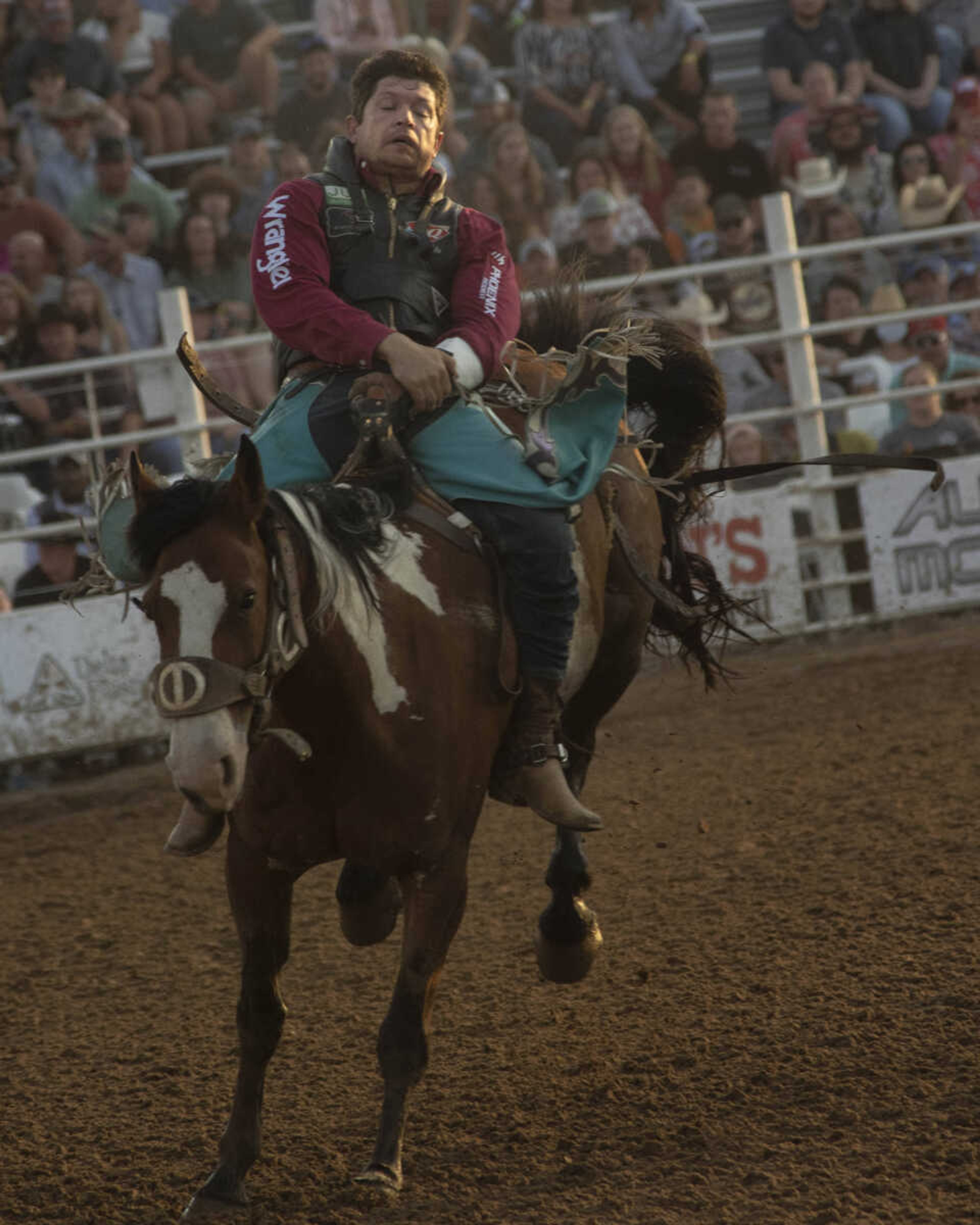 A rider performs during the last night of the Sikeston Jaycee Bootheel Rodeo Saturday, Aug. 14, 2021,&nbsp;in Sikeston, Missouri.