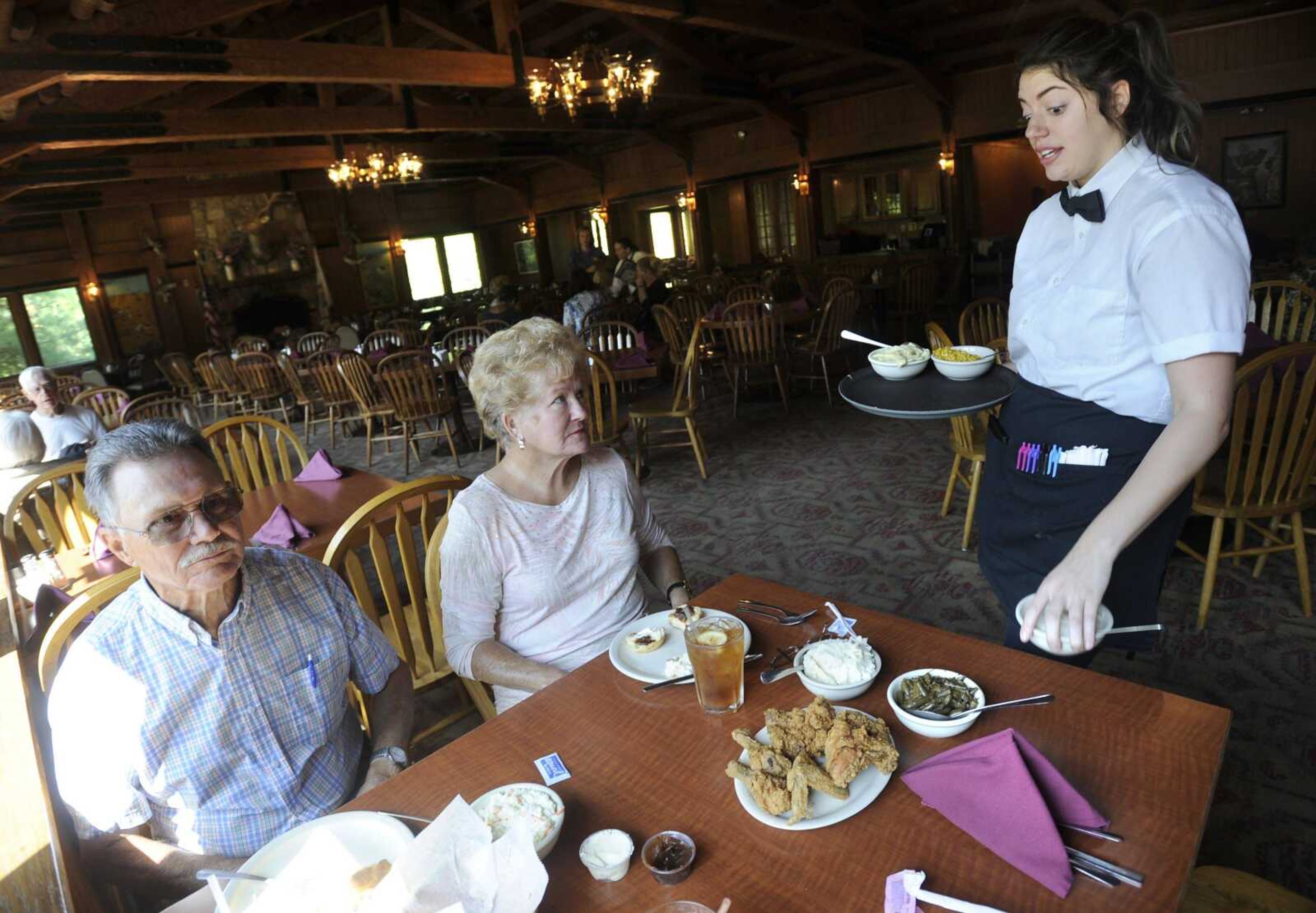 Marissa Melot serves Gerald and Linda Lotz in the dining room at Giant City Lodge on Sept. 8, 2017 in Makanda, Illinois.