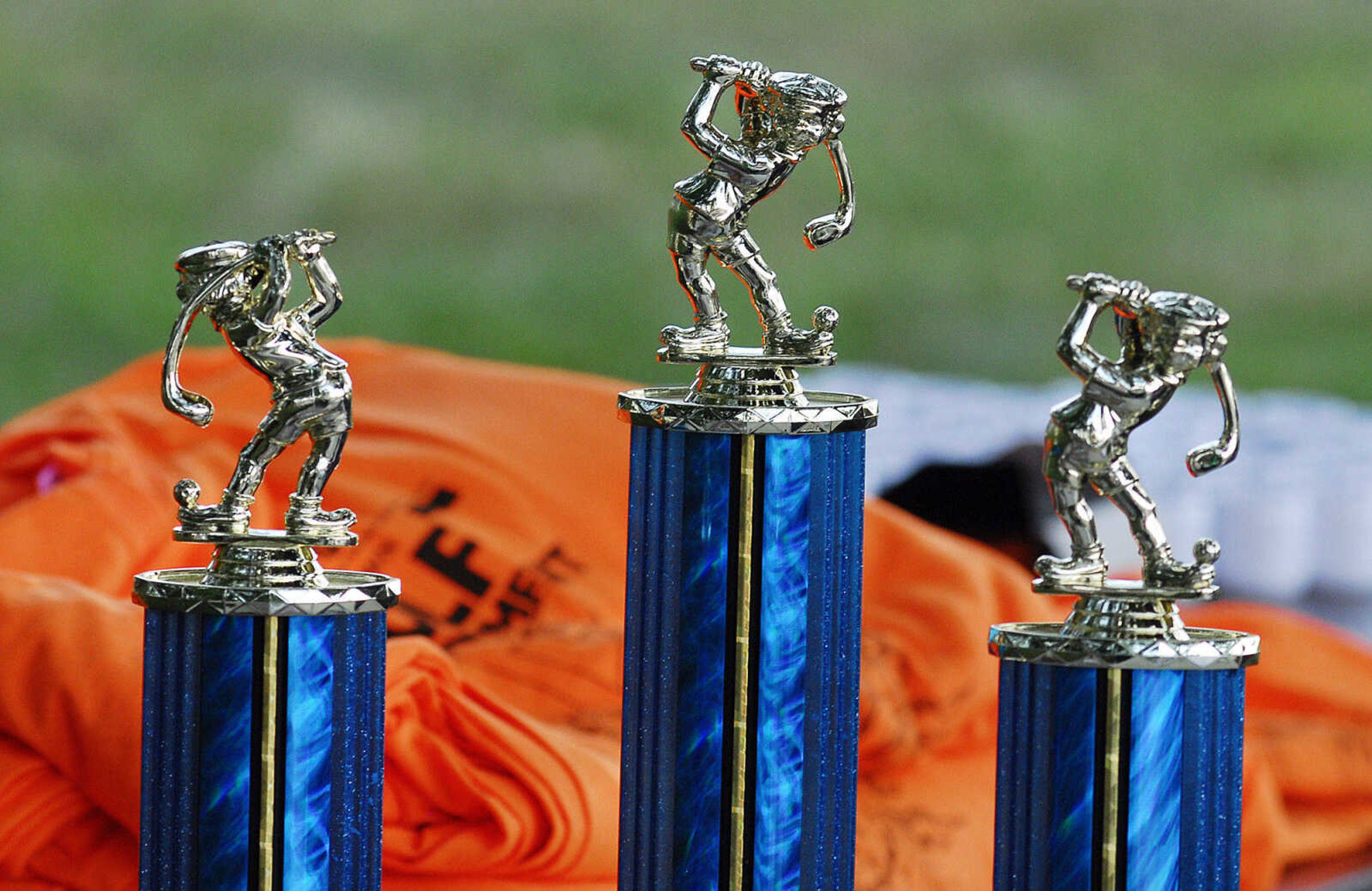 LAURA SIMON~lsimon@semissourian.com
First, second, and third place BirdieBall trophies wait to be won Sunday, June 27, 2010 during the First-Ever Fifth Annual Louis J. Lorimier World Famous Downtown Golf Tournament in Cape Girardeau.