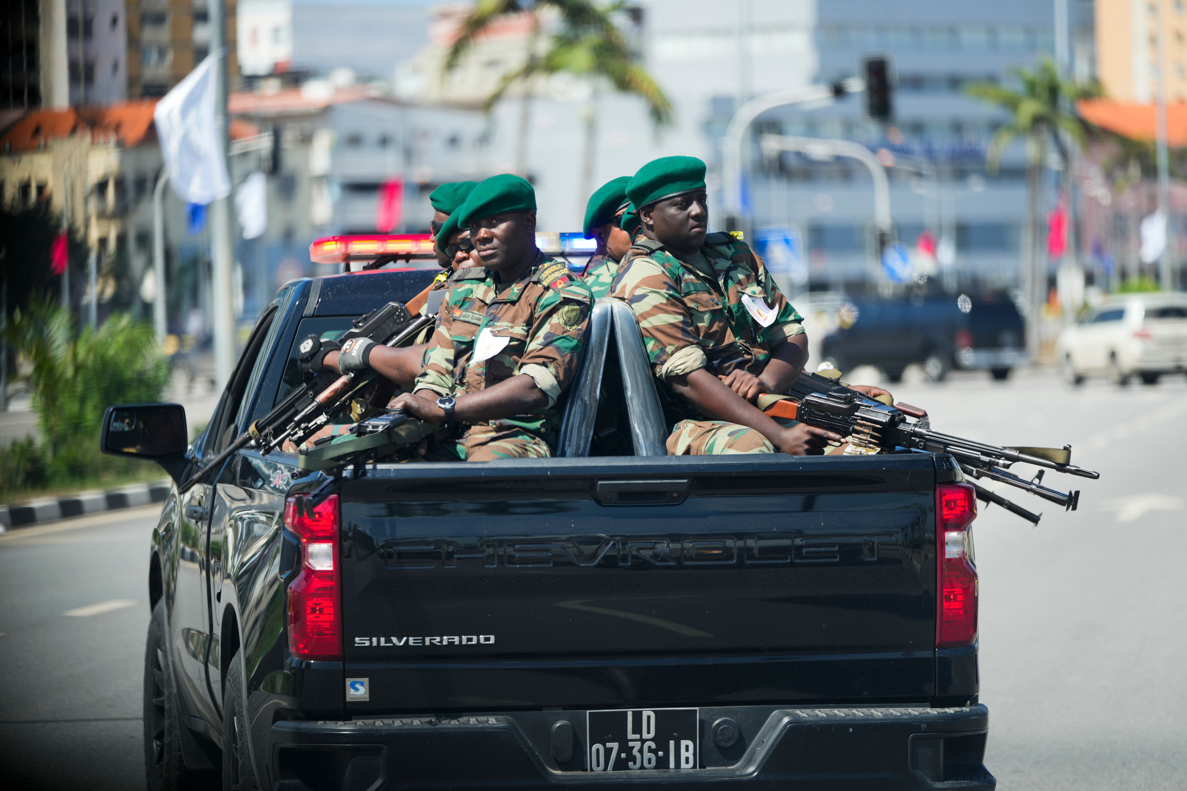 Angolan soldiers escort the motorcade of President Joe Biden in Luanda, Angola, on Wednesday, Dec. 4, 2024. (AP Photo/Ben Curtis)