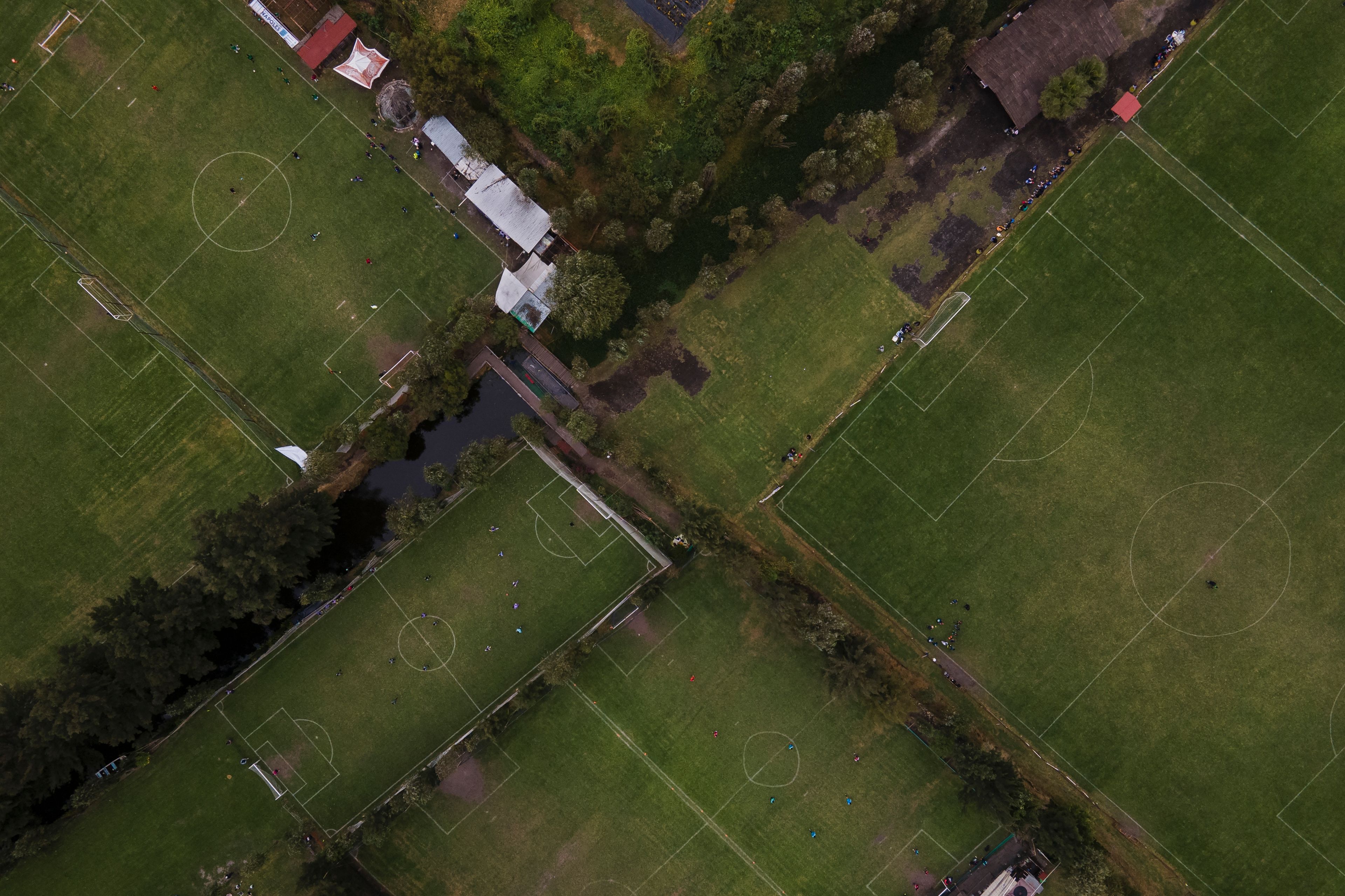 New soccer fields can be seen where ancestral floating gardens once grew in the Xochimilco borough of Mexico City, on Sunday, October 20, 2024. (AP Photo/Felix Marquez)