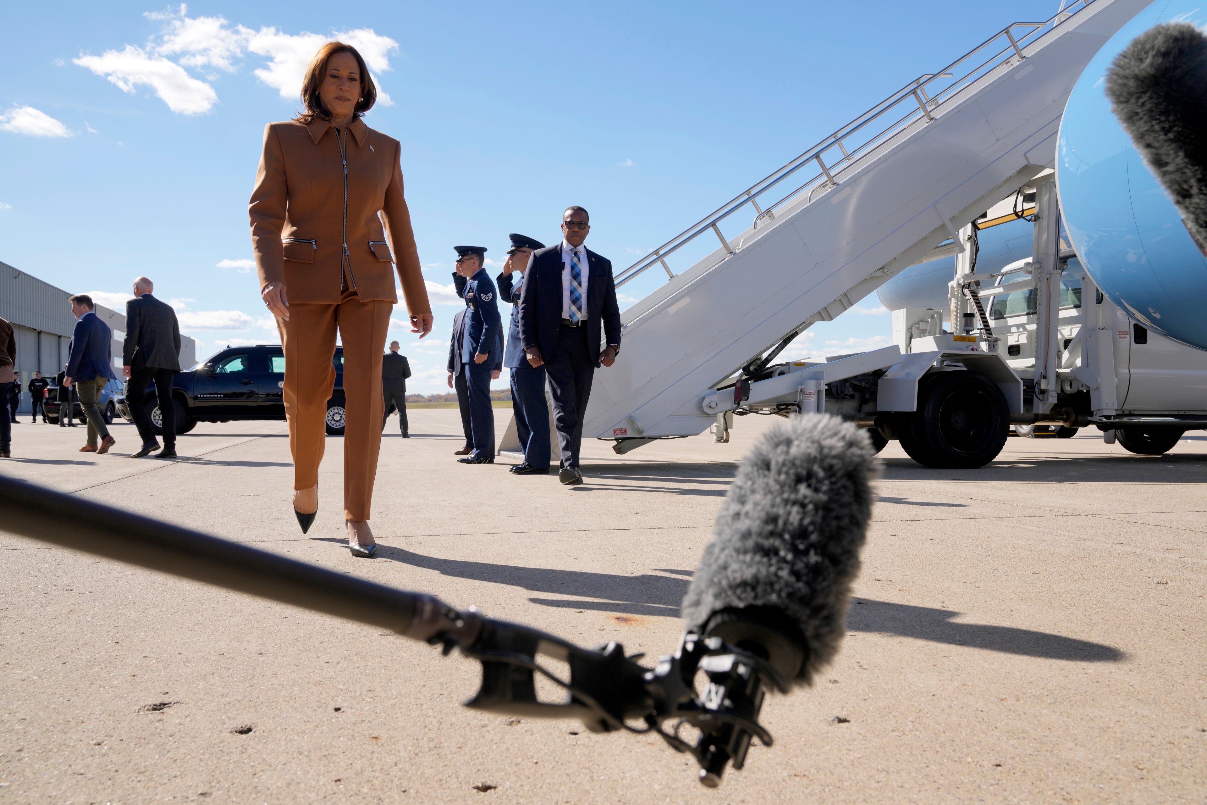 Democratic presidential nominee Vice President Kamala Harris speaks with reporters upon arriving at Kellogg Regional Airport in Battle Creek, Mich., Saturday, Oct. 26, 2024. (AP Photo/Jacquelyn Martin)