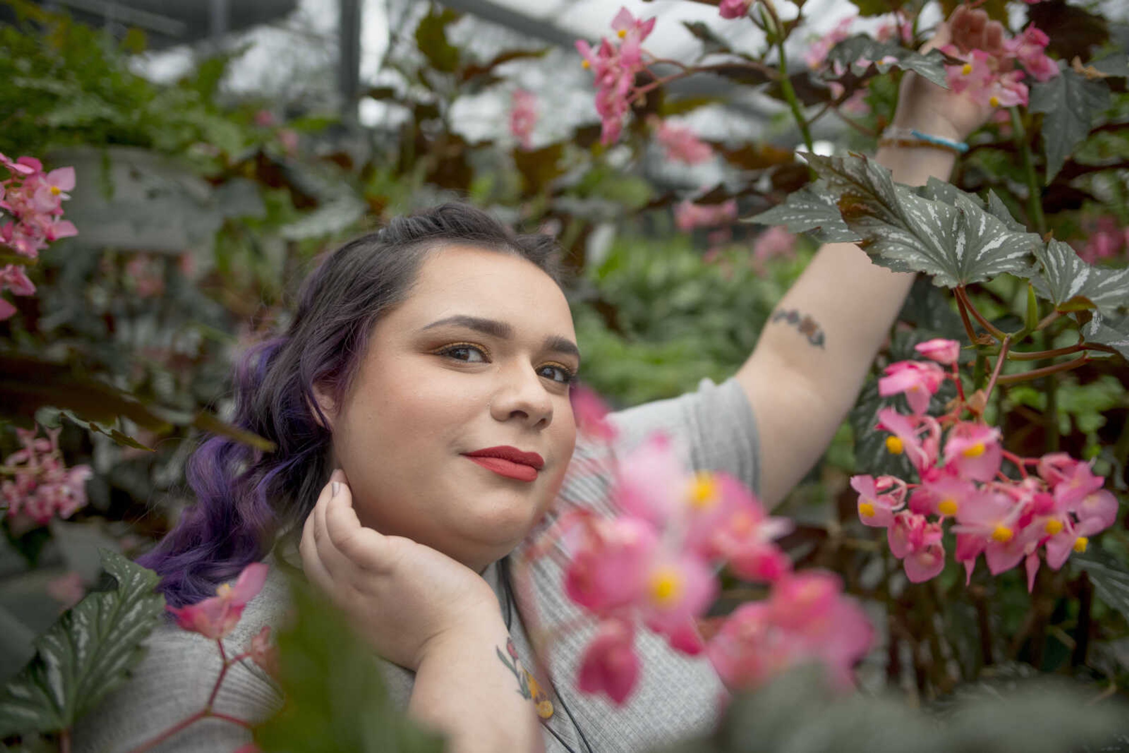 Peyton Cabral poses for a photo on Tuesday, Feb. 4, 2020, at the Southeast Missouri State University Charles Hutson Horticulture Greenhouse in Cape Girardeau.