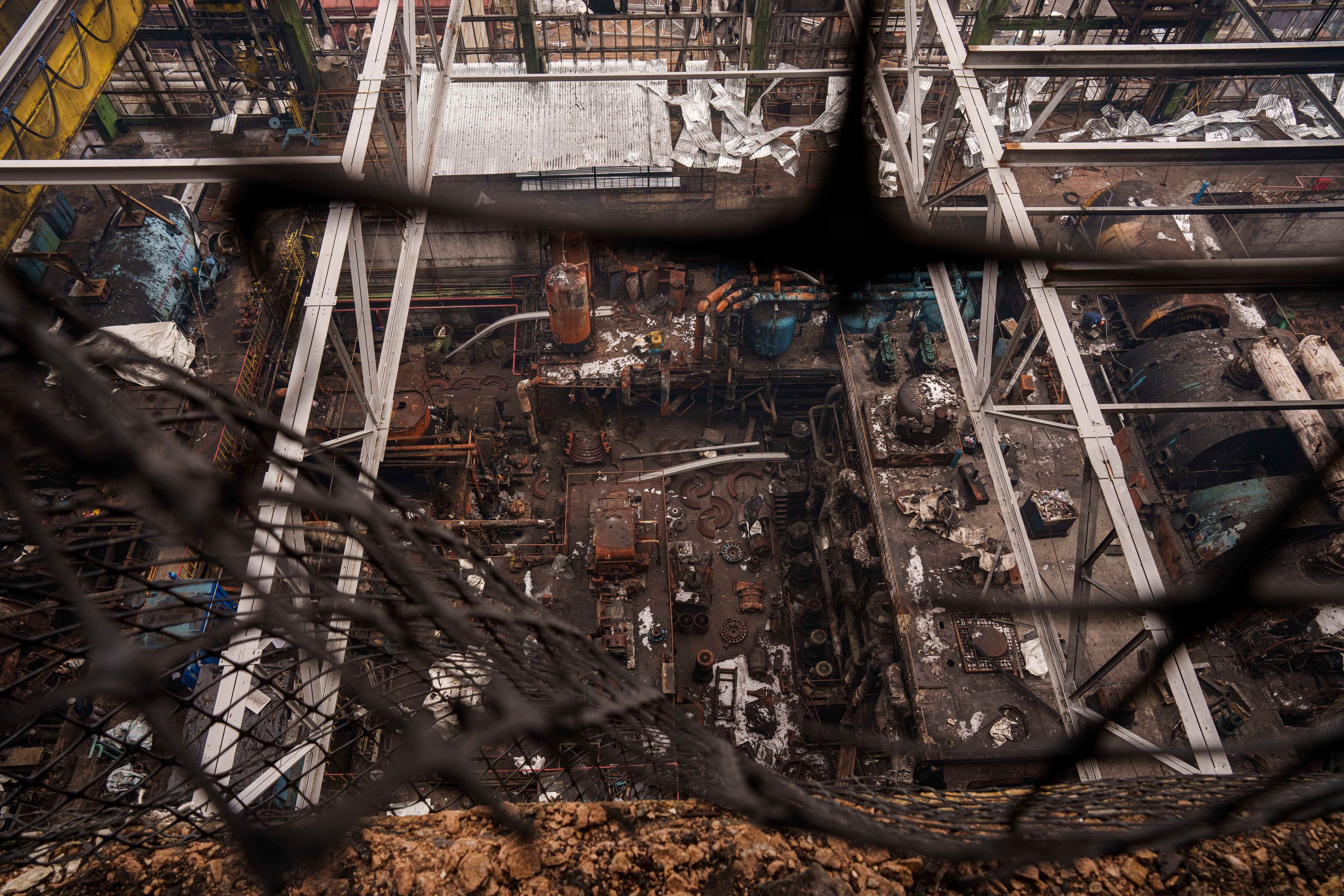 Production hall is seen destroyed though the roof after a recent Russian missile attack at DTEK's power plant in Ukraine, Nov. 28, 2024. (AP Photo/Evgeniy Maloletka)