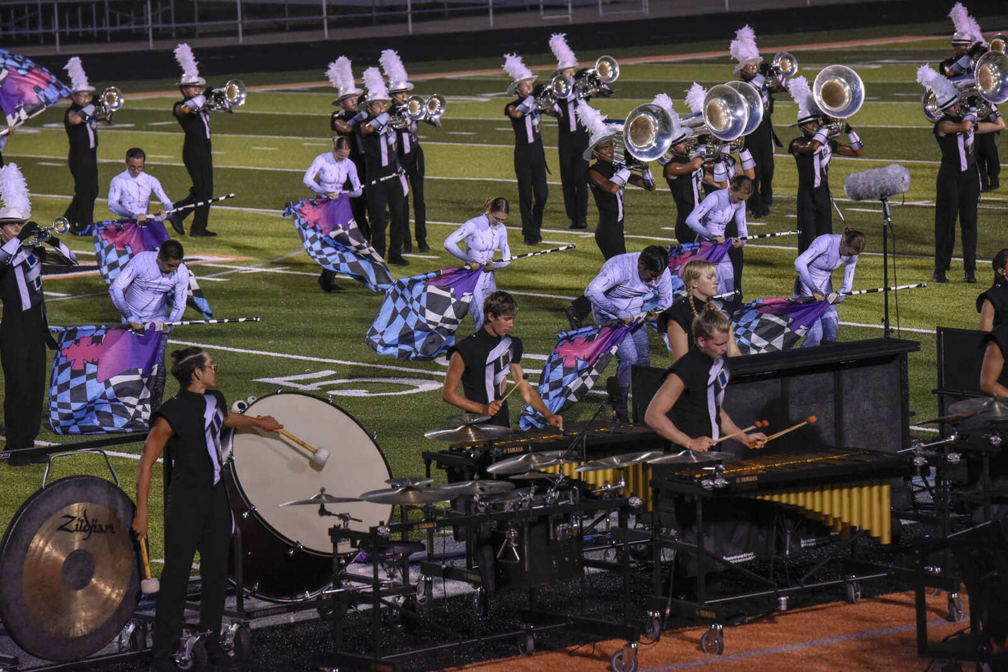 Crossmen from San Antonio, Texas perform during the Drum Corps International program "Drums Along the Mississippi" at the Cape Central High School field Tuesday Aug. 10, 2021.