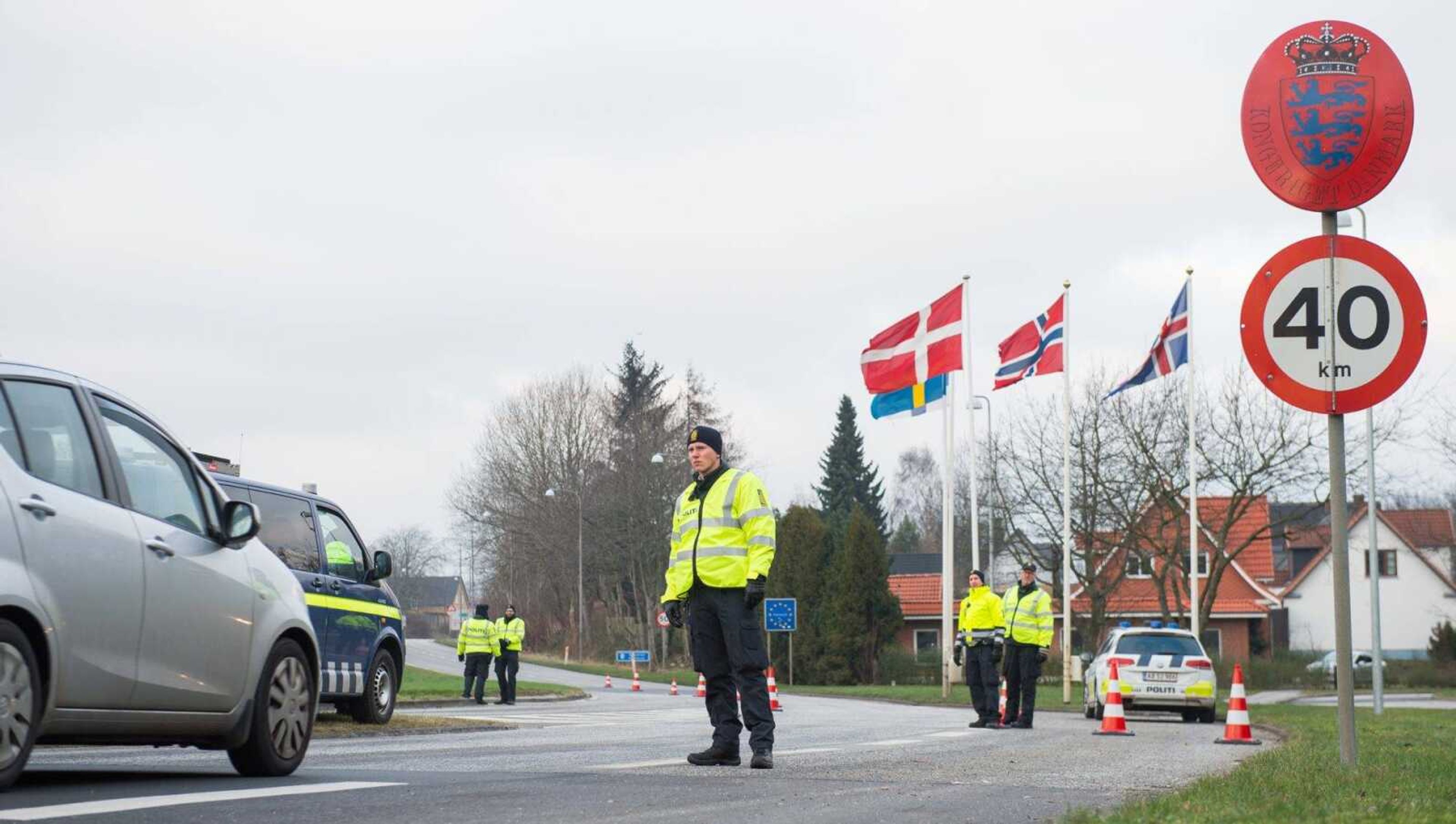 Danish policemen patrol the German-Danish border crossing Harrislee, Germany, on Monday. (Benjamin Nolte ~ dpa via AP)